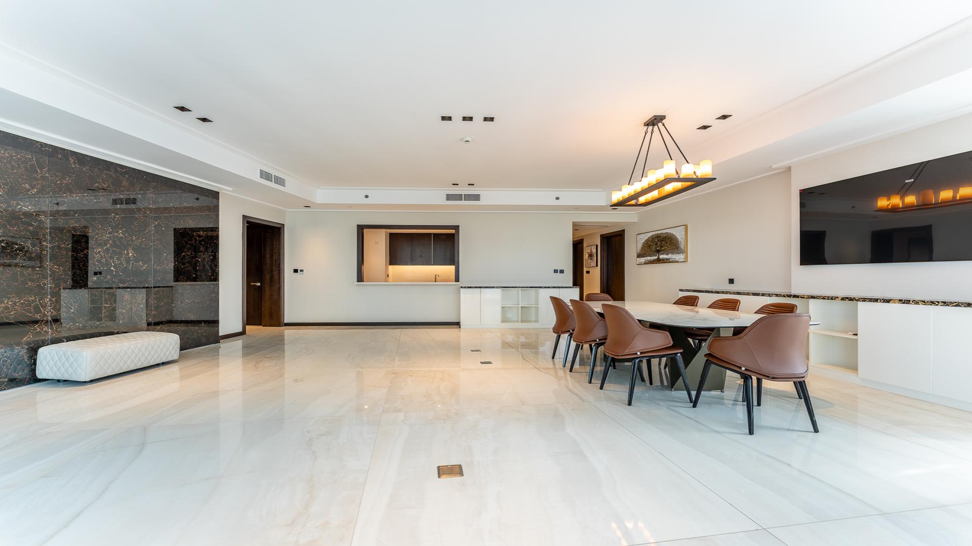 Spacious dining area in four-bedroom apartment, Downtown Dubai, with Burj Khalifa views