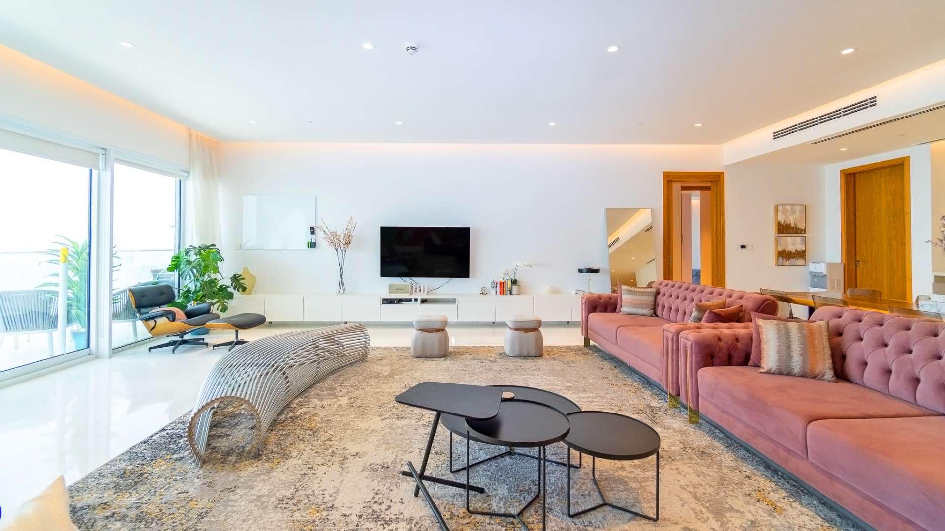 Luxury balcony with sea views, modern seating, and glass railing at 1 JBR apartment