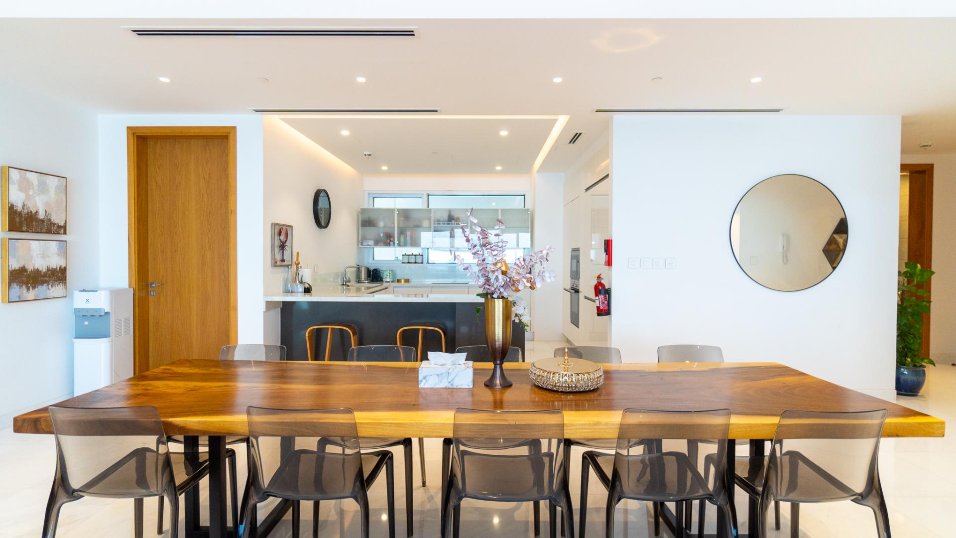 Luxurious open-plan living area in Jumeirah Beach Residence apartment with sea views