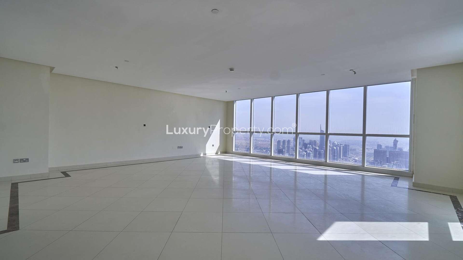 Luxurious open-plan living area in Dubai Marina duplex penthouse with sea views