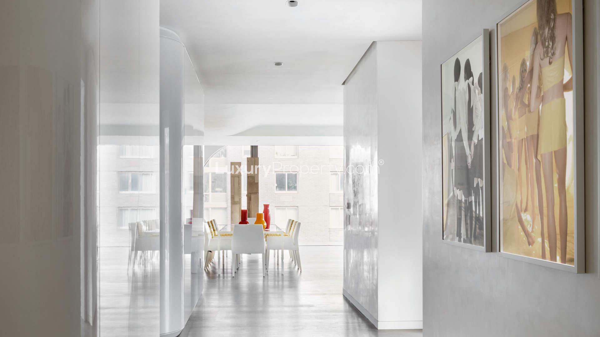 Luxurious Zaha Hadid-designed bedroom in Manhattan apartment, featuring modern decor and unique window