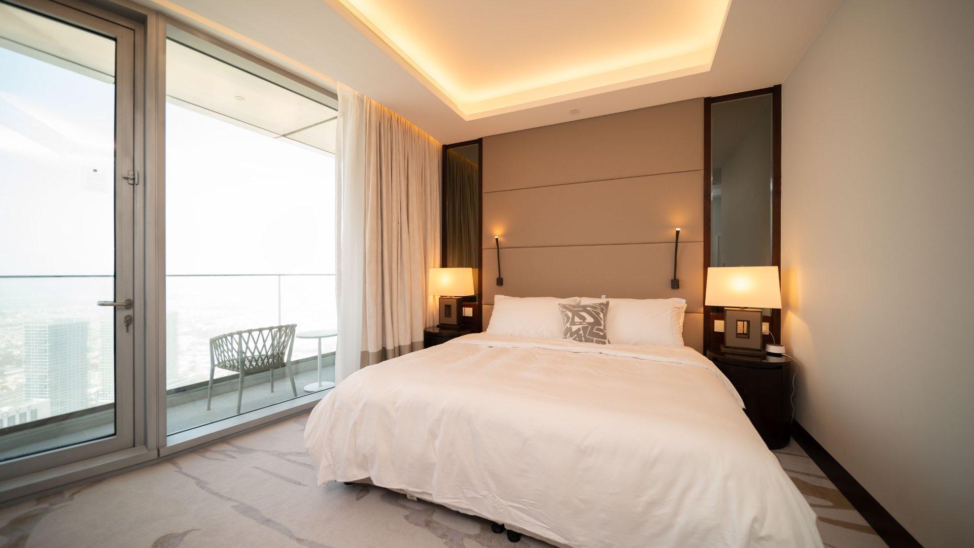 Luxurious furnished living room with Burj Khalifa views in Sky View apartment, Downtown Dubai