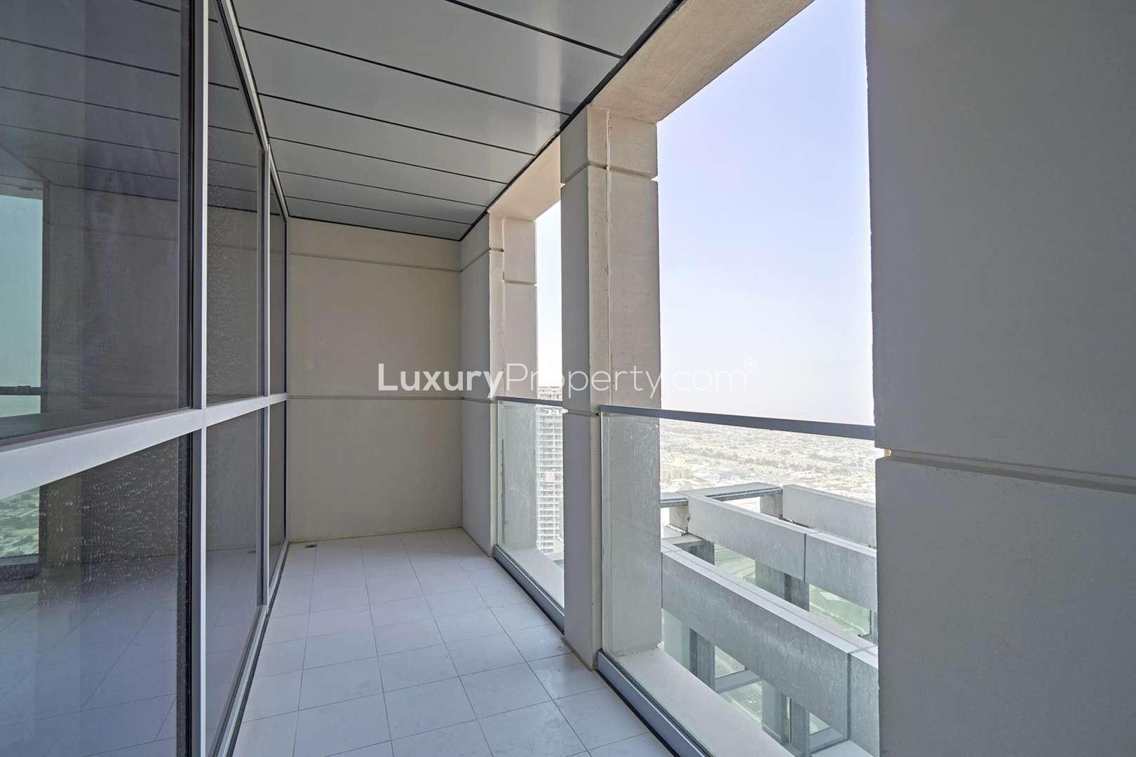 Spacious living area with marble flooring in Amna Tower apartment, Al Habtoor City