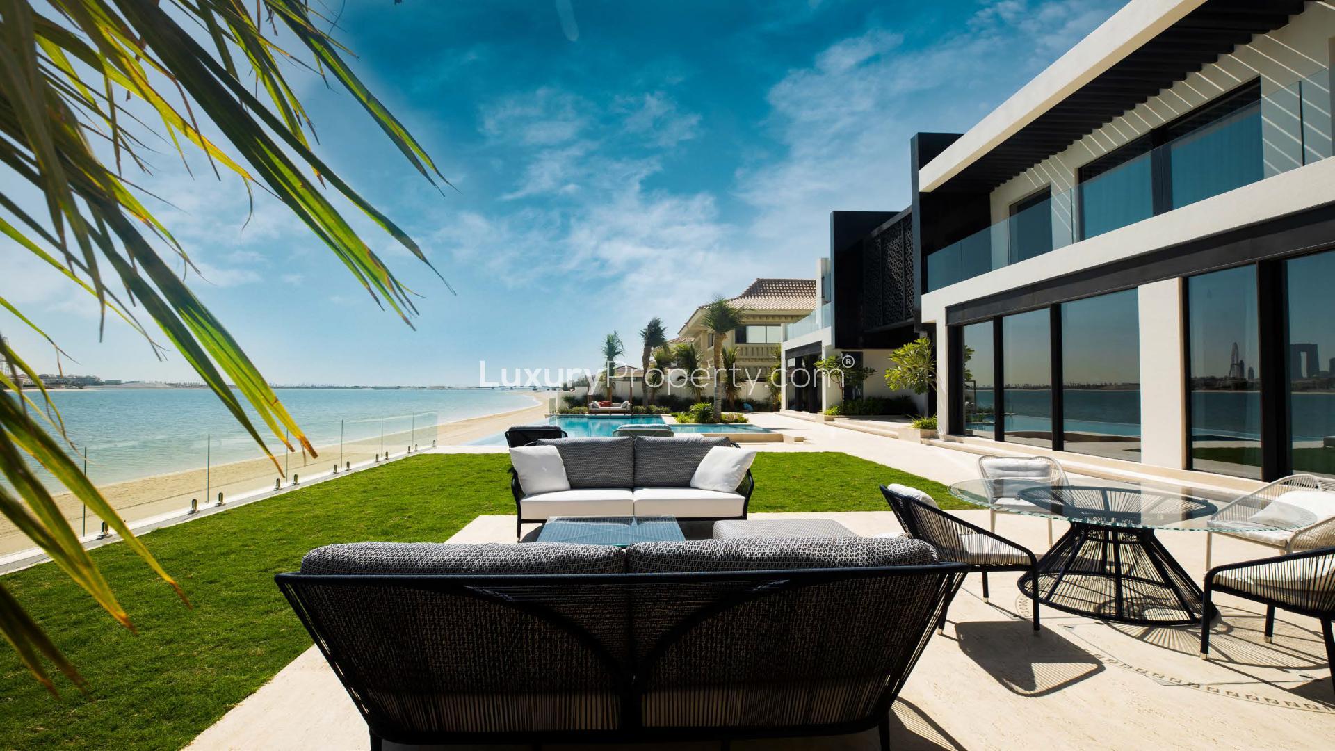 Luxurious living room with waterfront view in Palm Jumeirah Signature Villa, Dubai