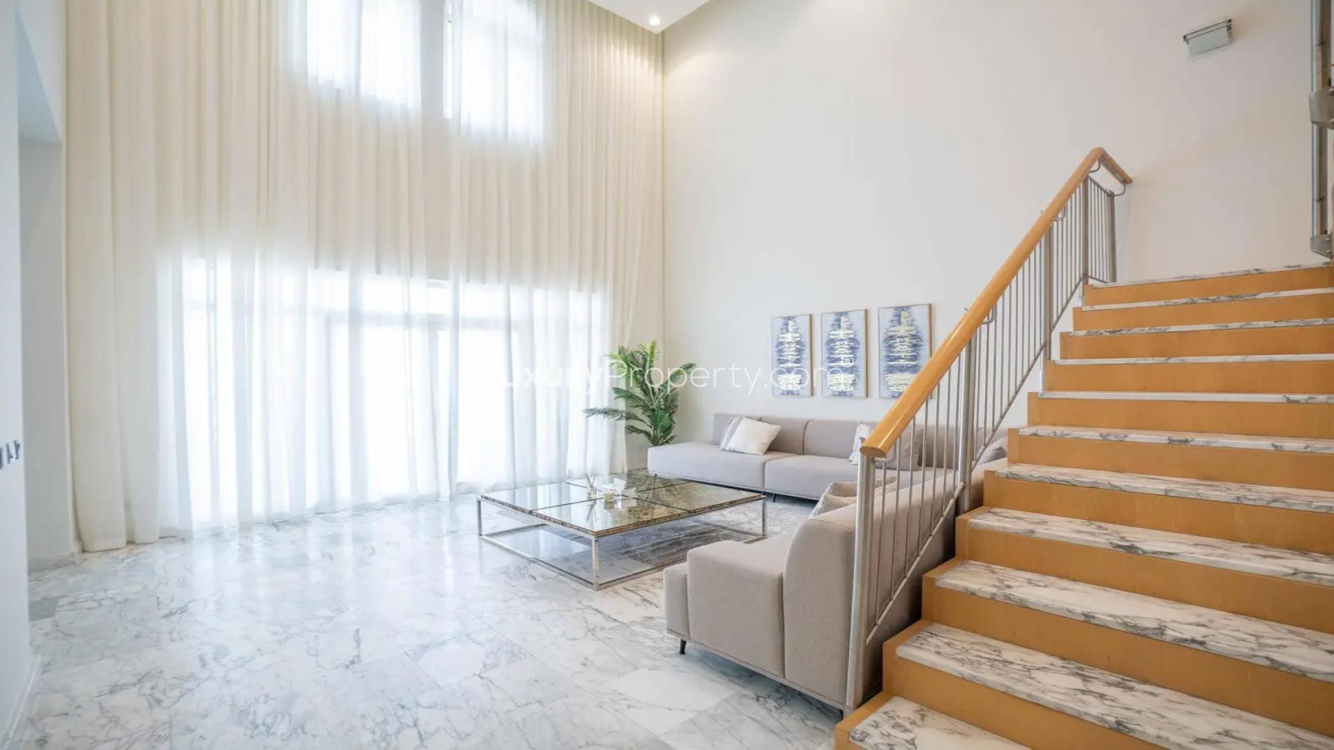 Luxurious living room in upgraded 4-bedroom penthouse, Al Shahla, Palm Jumeirah, marble flooring