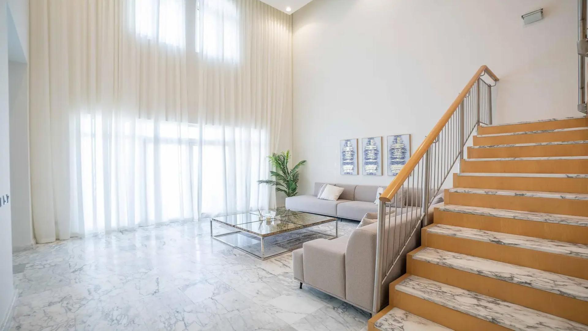 Luxurious living room in upgraded 4-bedroom penthouse, Al Shahla, Palm Jumeirah, marble flooring