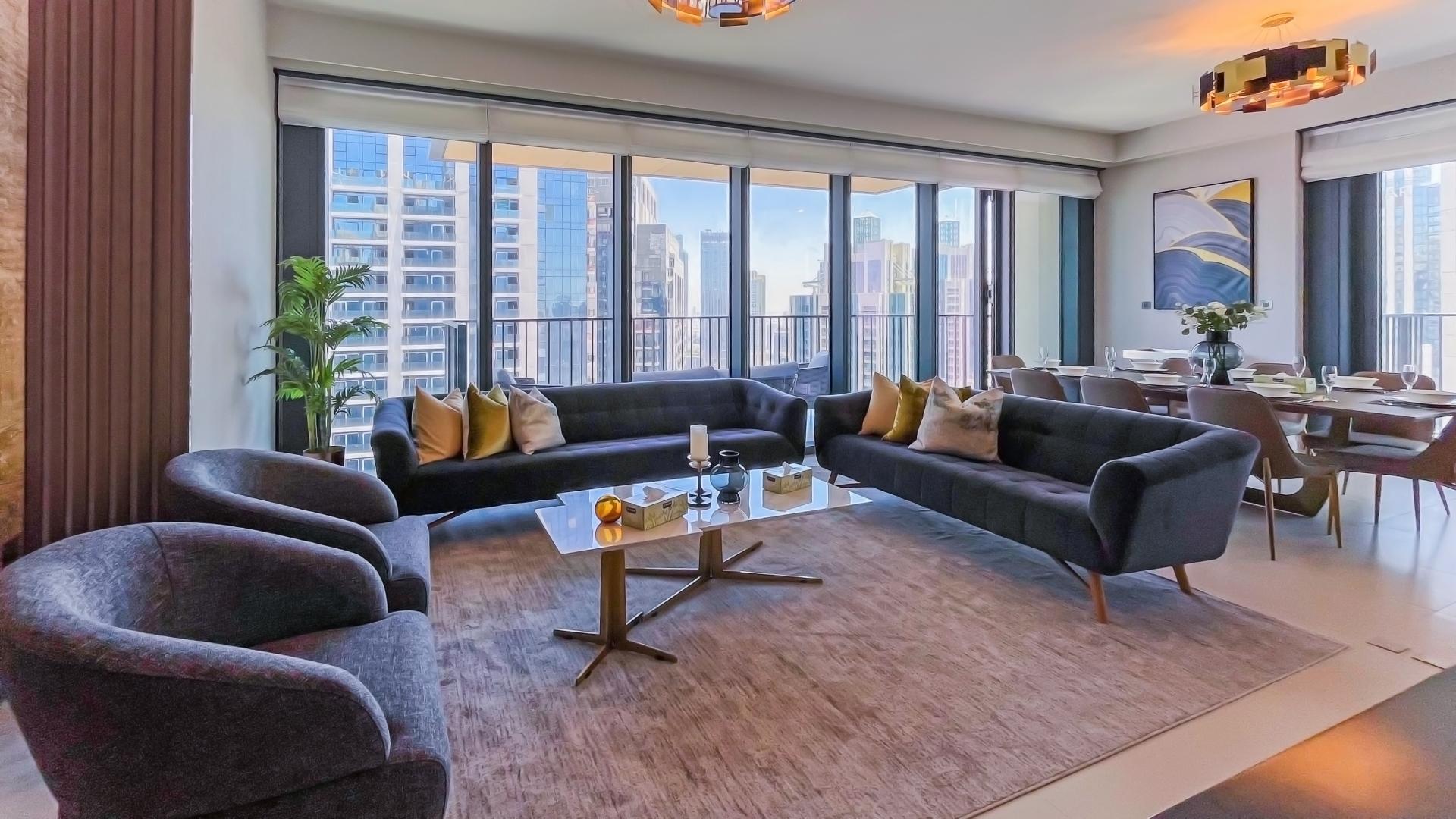 Luxurious dining area in 4-bedroom apartment, BLVD Heights, Downtown Dubai, with city view