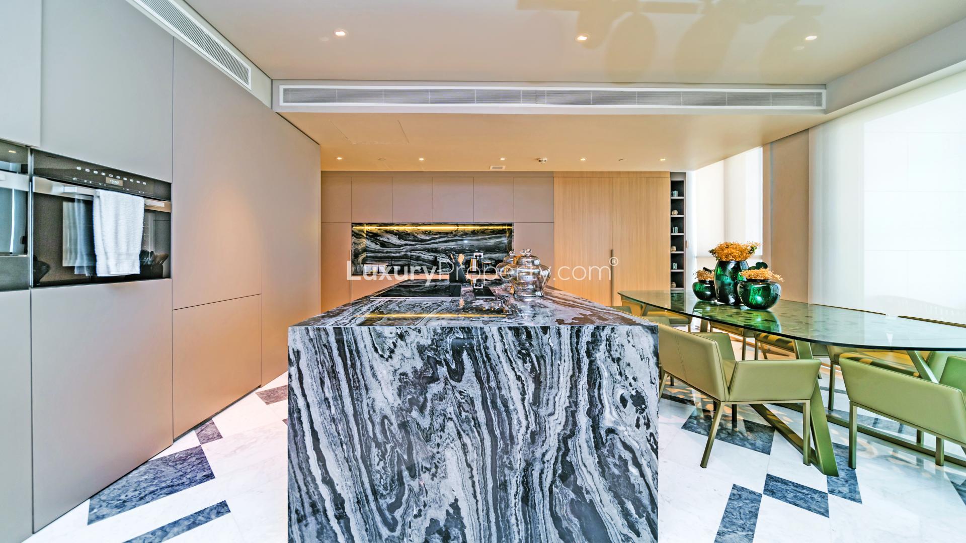 Modern living room in 4-bedroom duplex condo, City Walk, featuring stylish decor and artwork