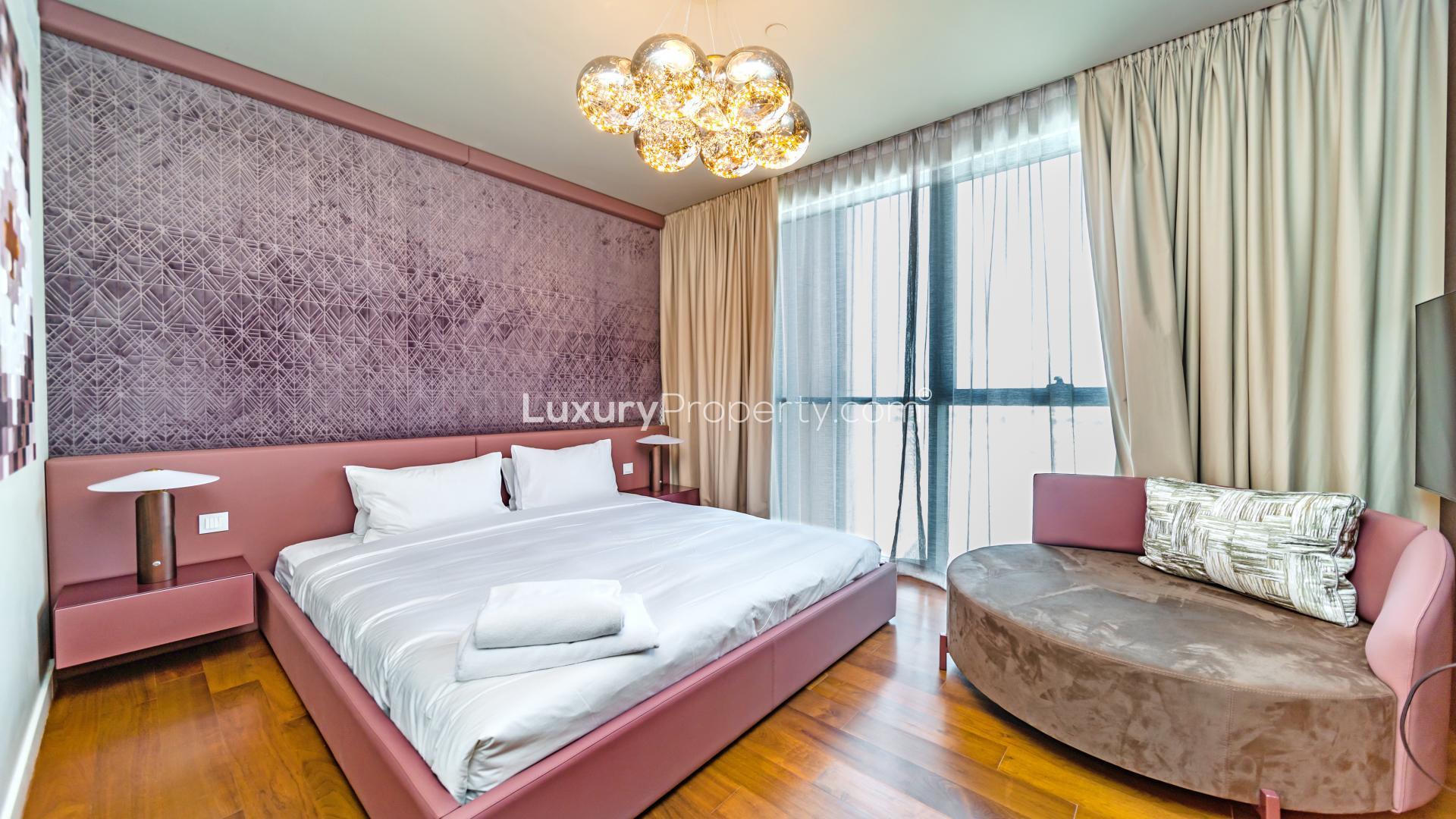 Modern kitchen with marble island in 4-bedroom duplex condo, City Walk, Building 13B