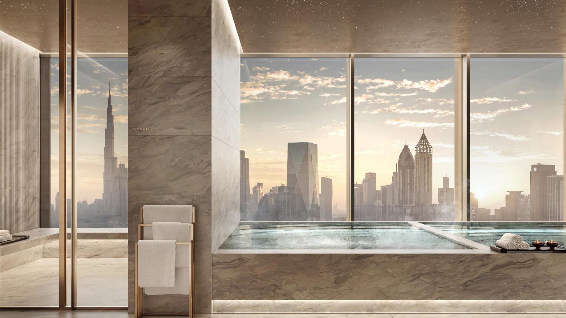 Luxury bathroom with skyline view in Jumeirah Residences Emirates Towers apartment for sale