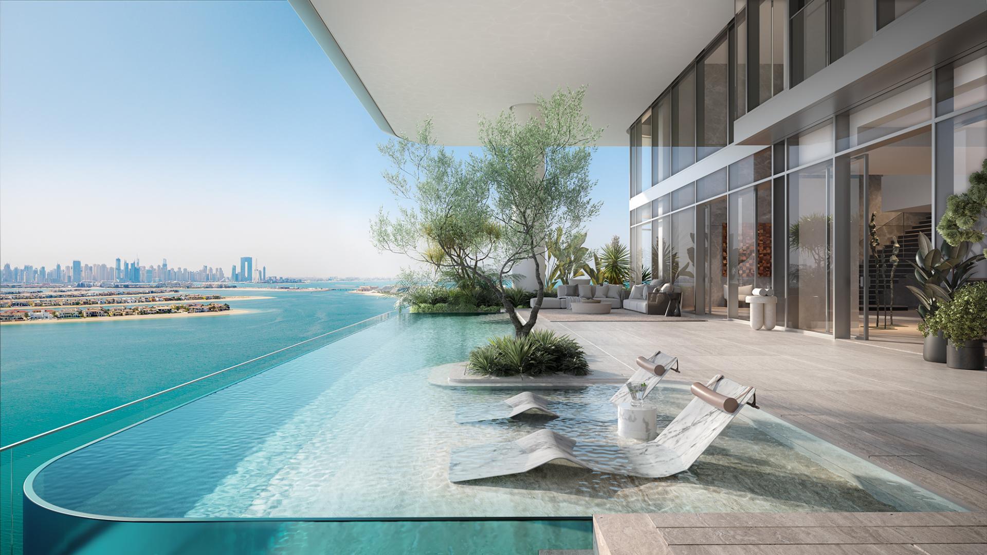 Luxurious terrace view from 4-bedroom duplex at Orla Infinity, Palm Jumeirah, overlooking skyline