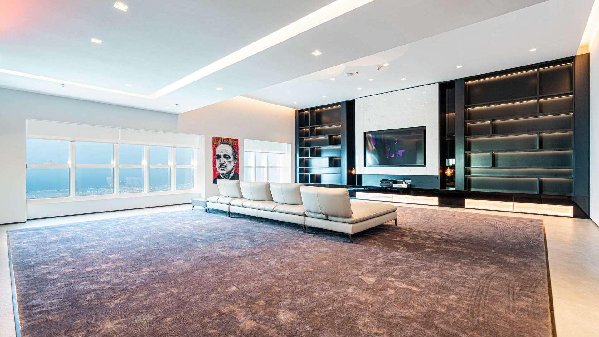 Panoramic view from Elite Residence penthouse in Dubai Marina overlooking Palm Jumeirah