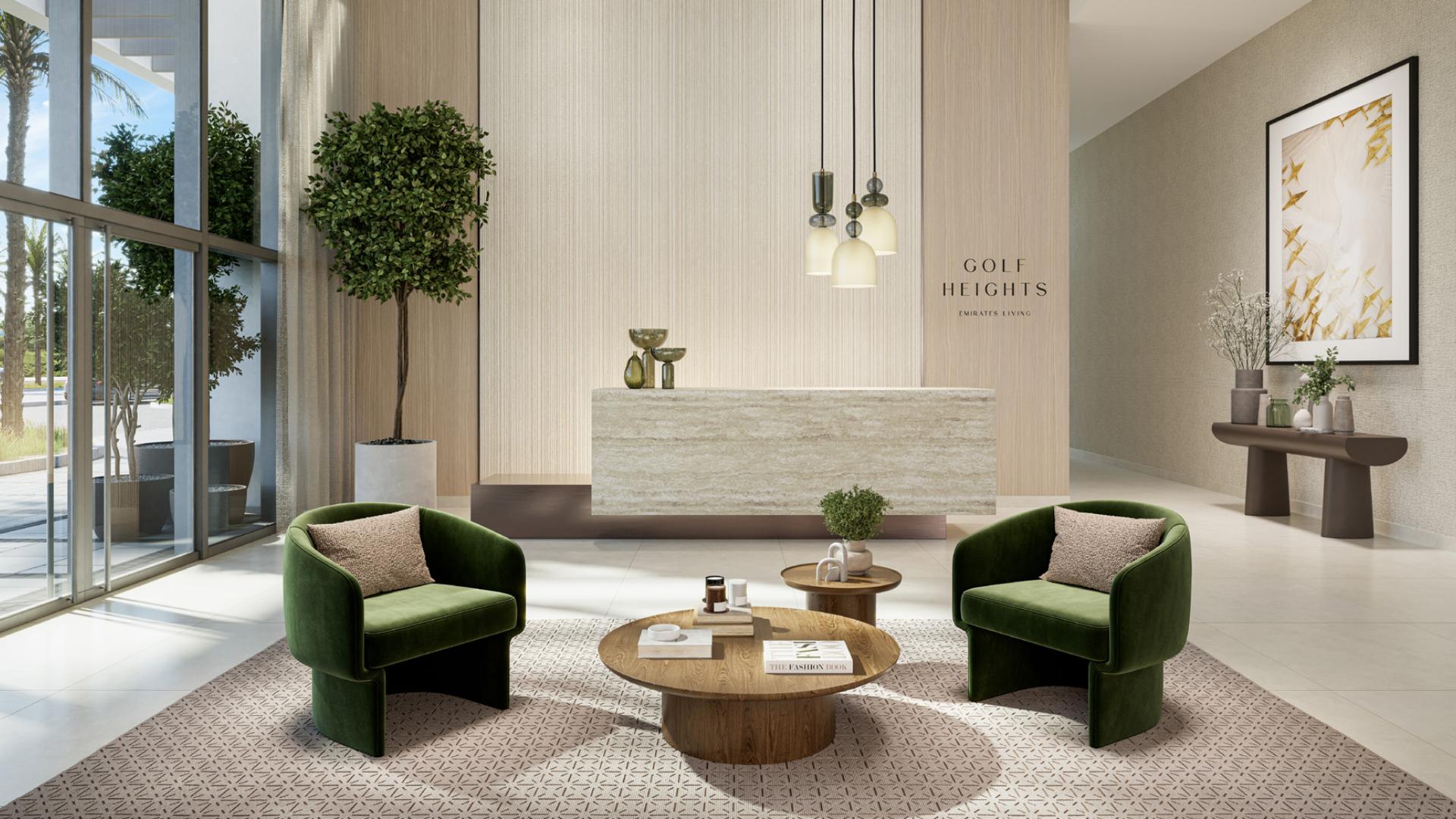 Modern lobby of Golf Heights apartment in Emirates Hills 2 with elegant seating area