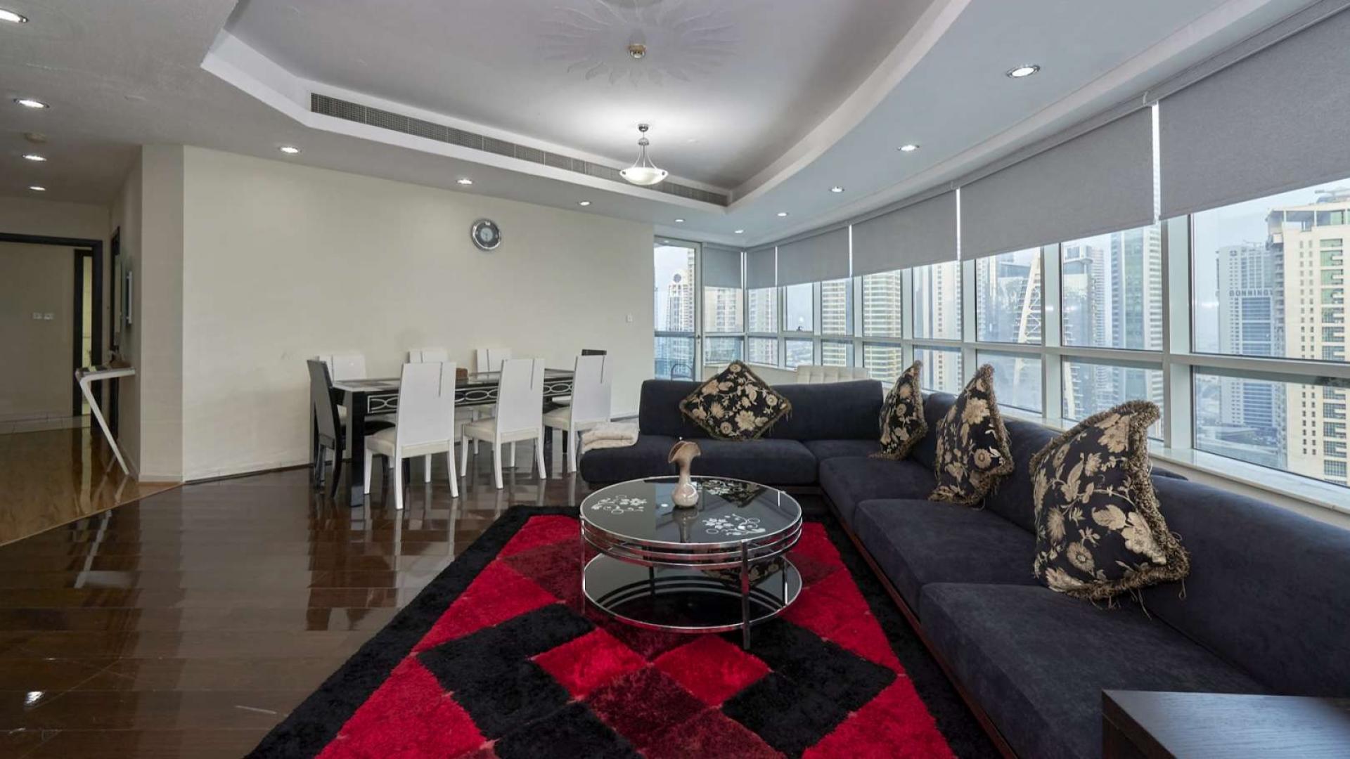 Luxurious living room in fully-furnished four-bed apartment, Horizon Tower, Dubai Marina