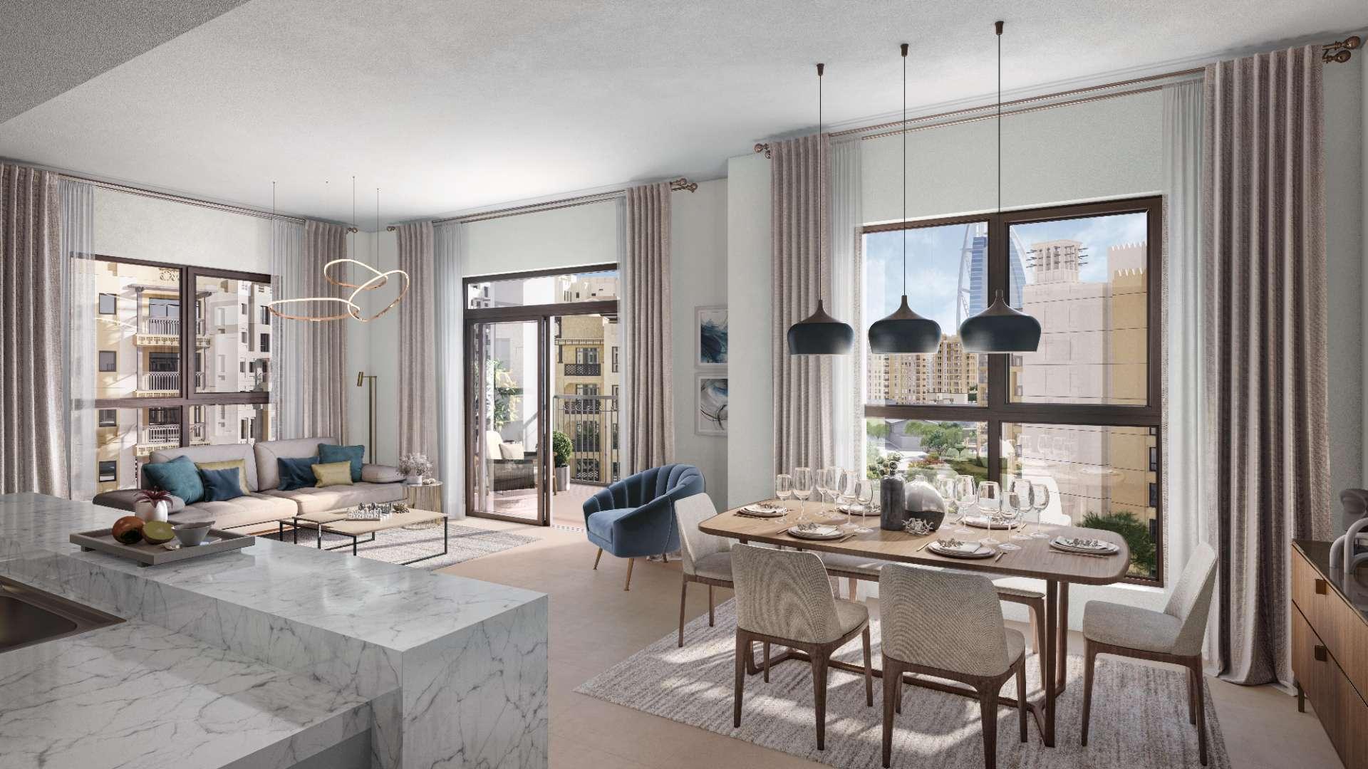 Luxurious living room in Madinat Jumeirah Living apartment with modern decor and large windows