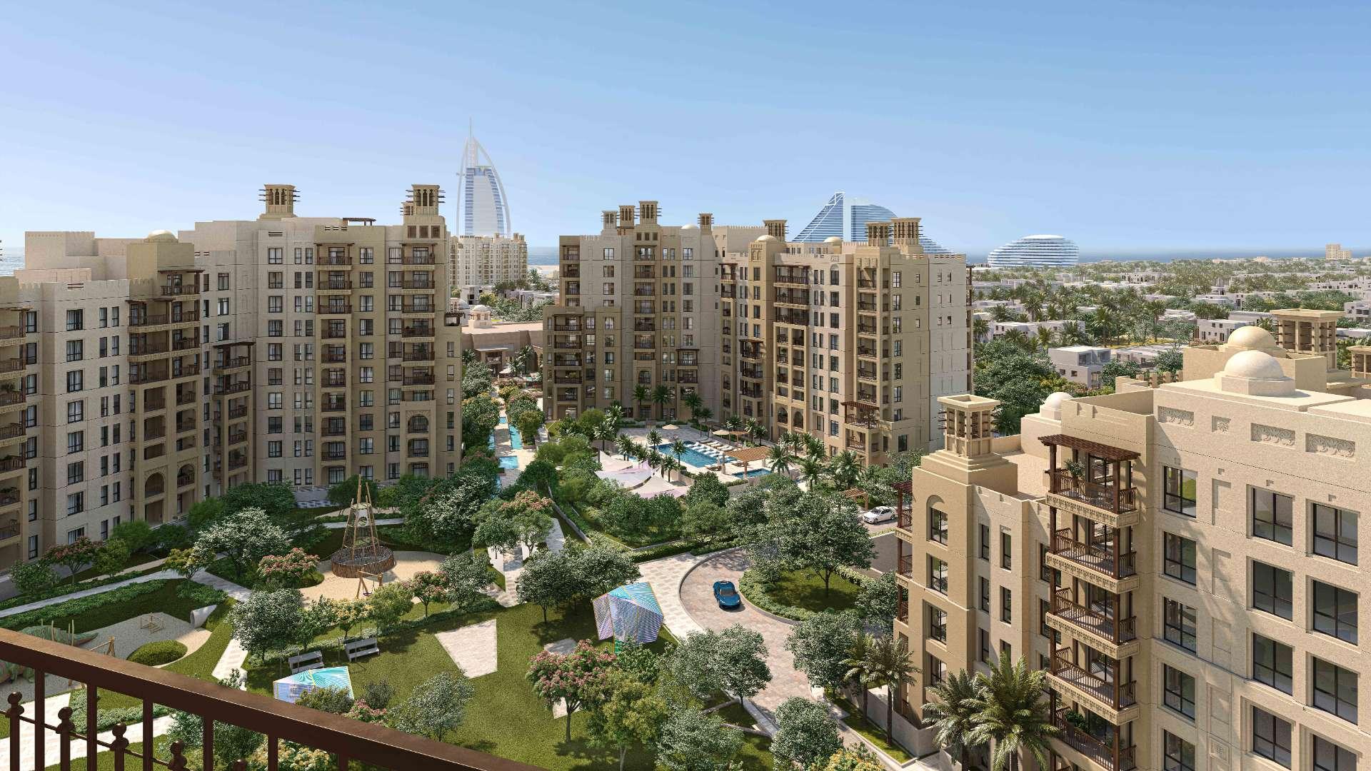 Stunning Madinat Jumeirah Living apartment view with lush gardens and iconic architecture
