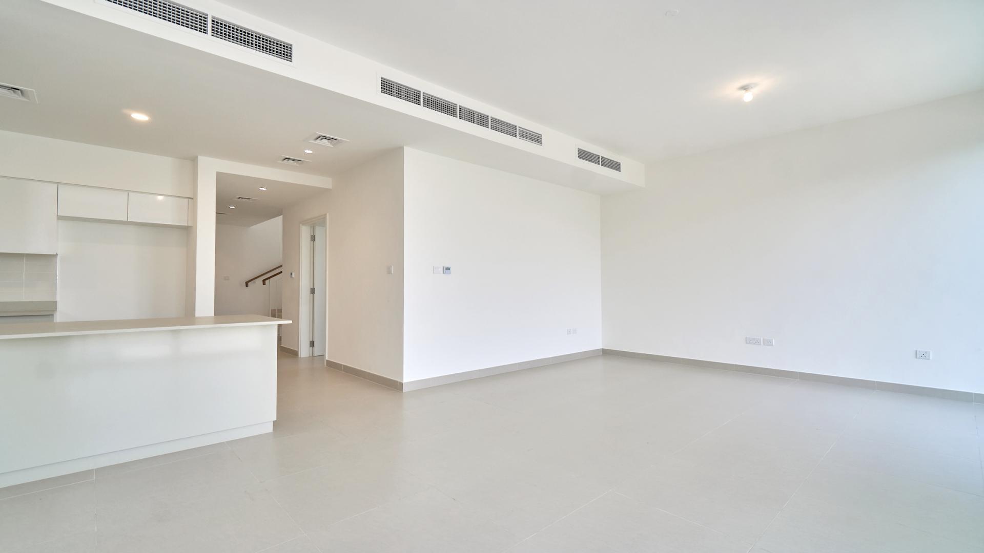 Exterior view of modern villa in Maple, Dubai Hills Estate, with private yard space