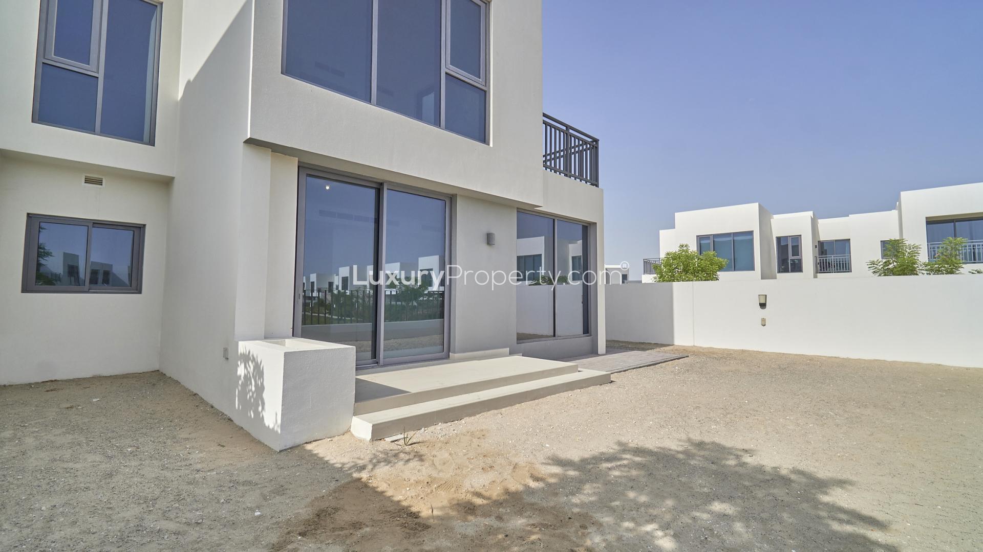 Open-plan kitchen and living area in Dubai Hills Estate villa for sale