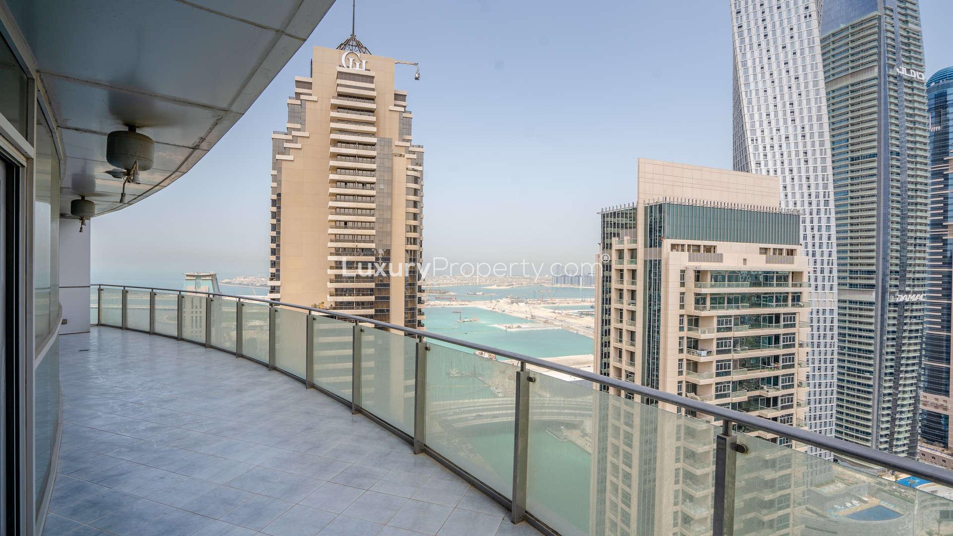 Spacious balcony with stunning Dubai Marina and sea views from penthouse at Marina Terrace