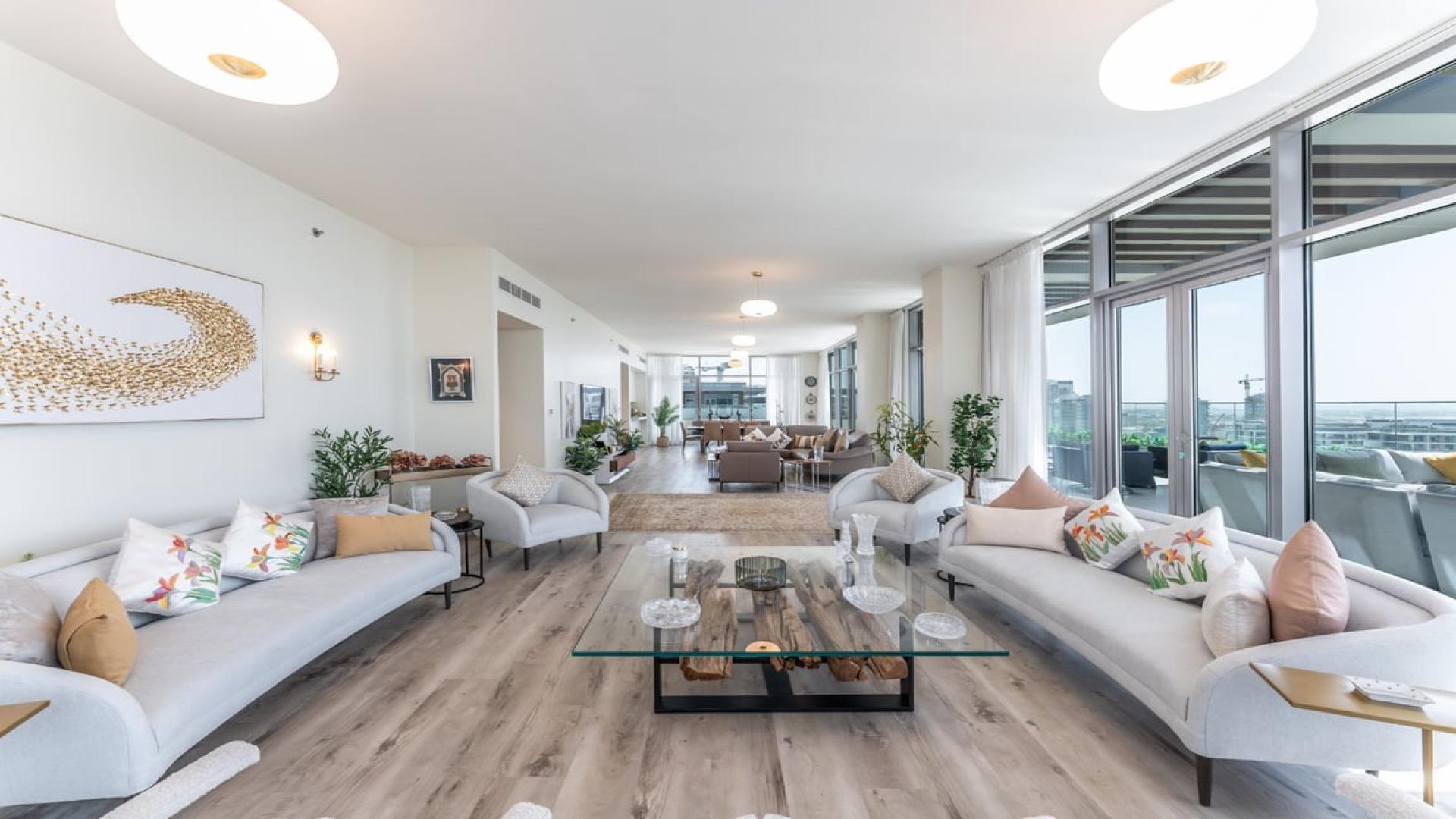 Penthouse terrace with modern seating, offering panoramic views in Dubai Hills Estate, Park Heights