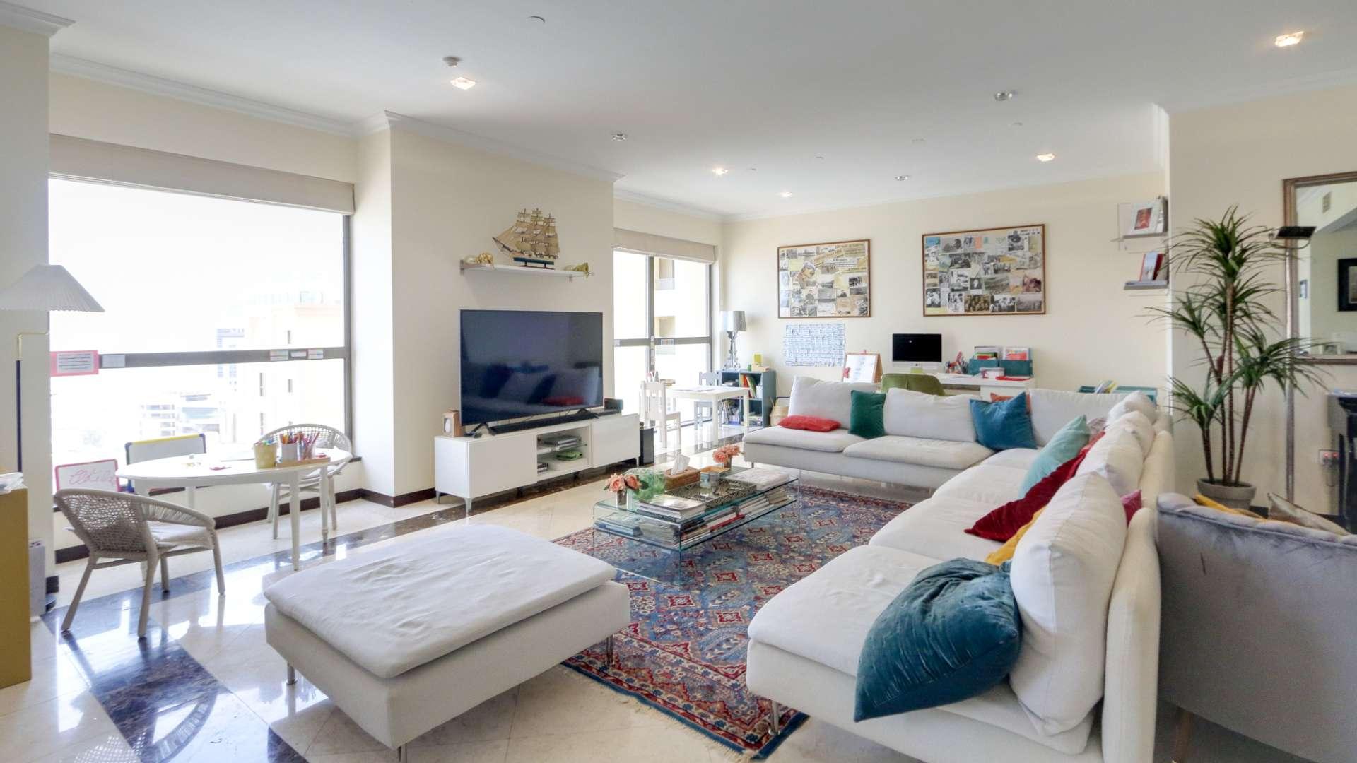 Spacious living and dining area in Murjan apartment, Jumeirah Beach Residence, with city view