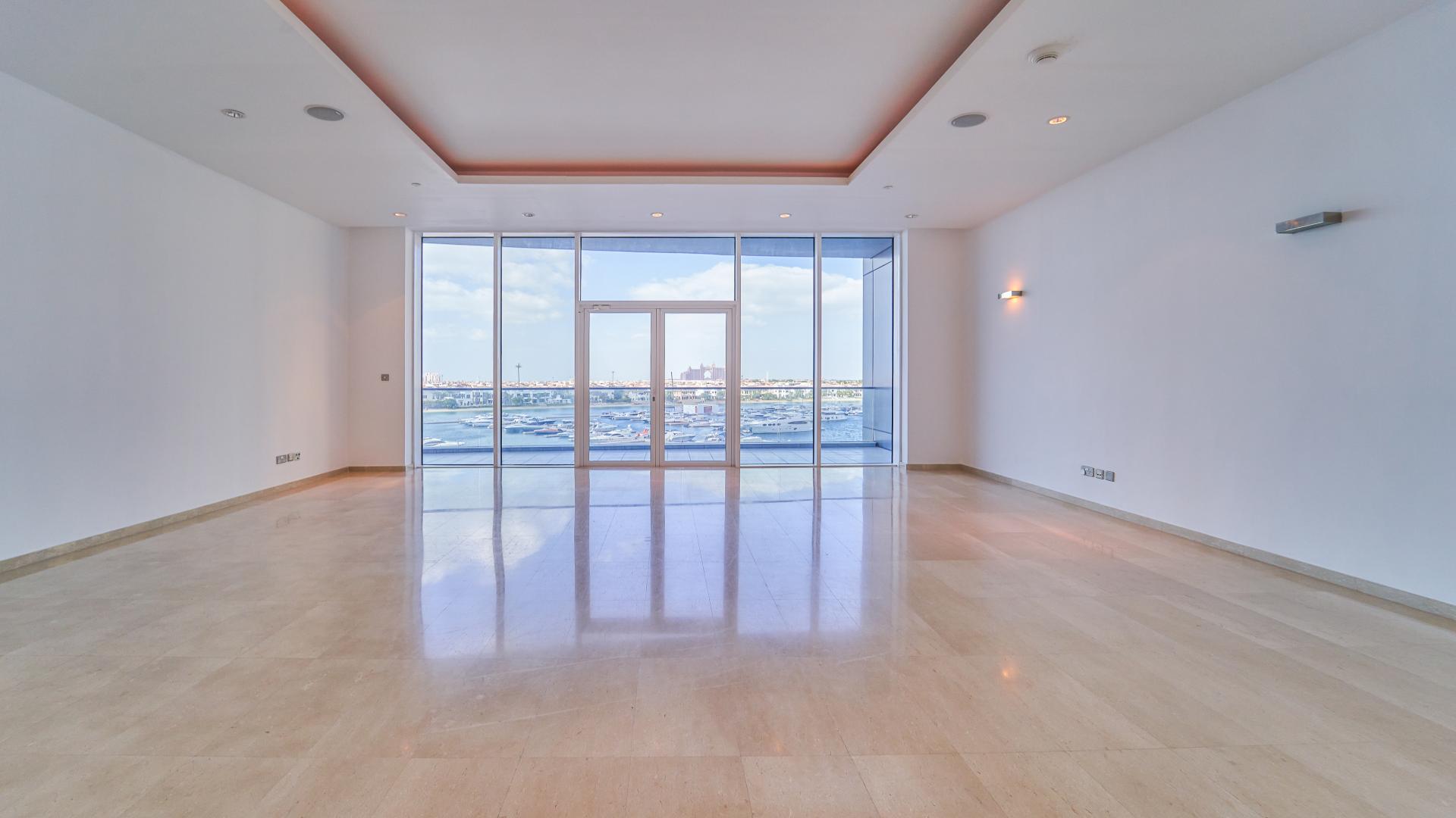 "Balcony view of yachts and ocean from Palm Jumeirah apartment, Oceana community, LP10855.",Spacious apartment living room with ocean view, Palm Jumeirah, Oceana community