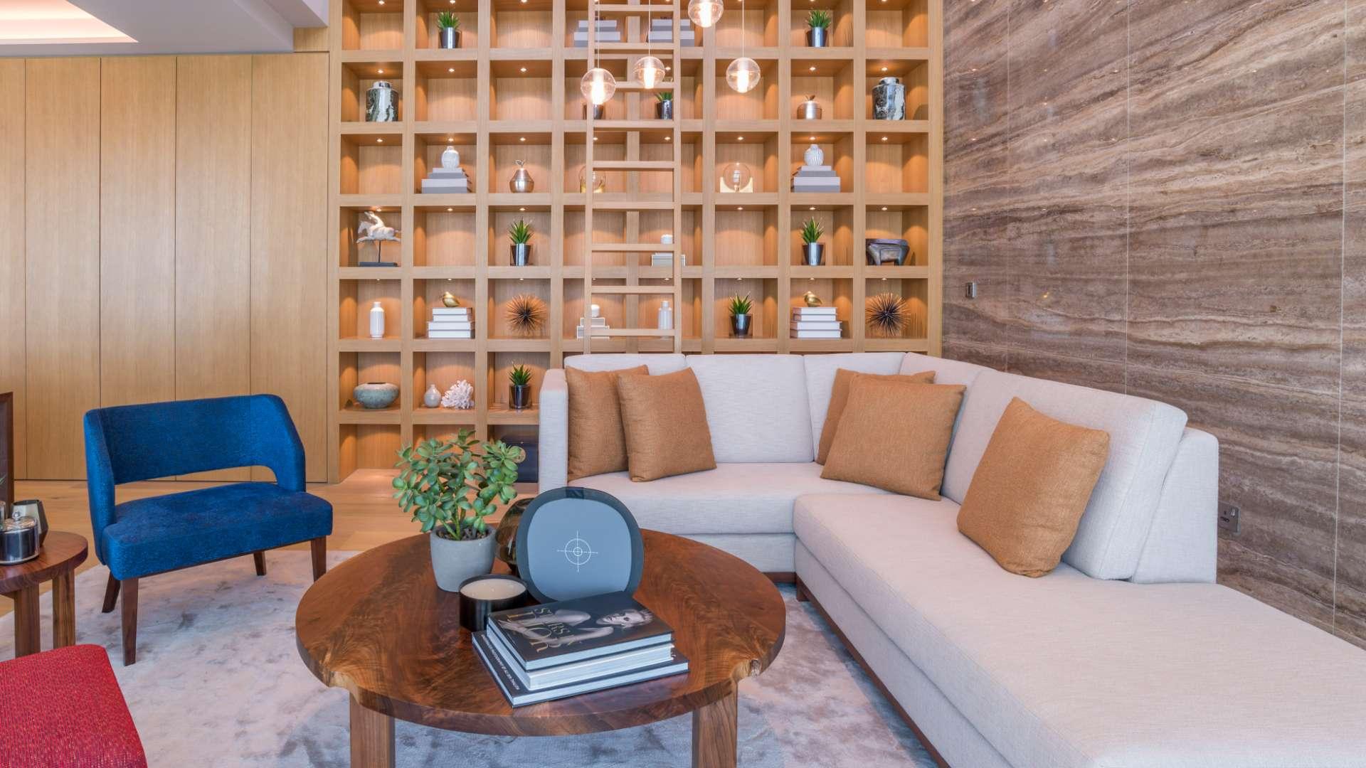 Aerial view of Palm Jumeirah skyline and sea near luxurious penthouse for sale