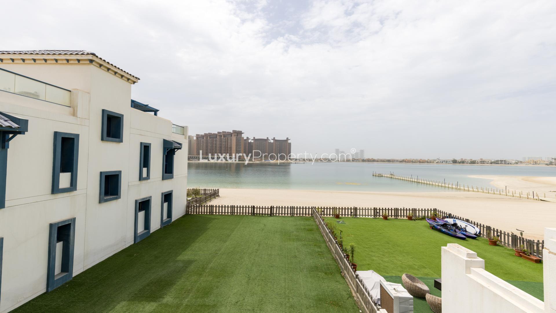 Beachfront townhouse in Palma Residences, Palm Jumeirah with spacious lawn and modern design