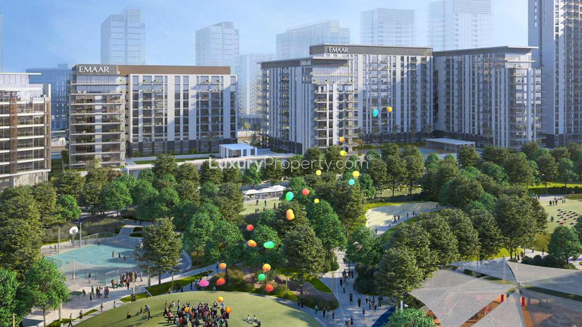 Aerial view of luxury apartments in Dubai Hills Estate, Park Field community at dusk