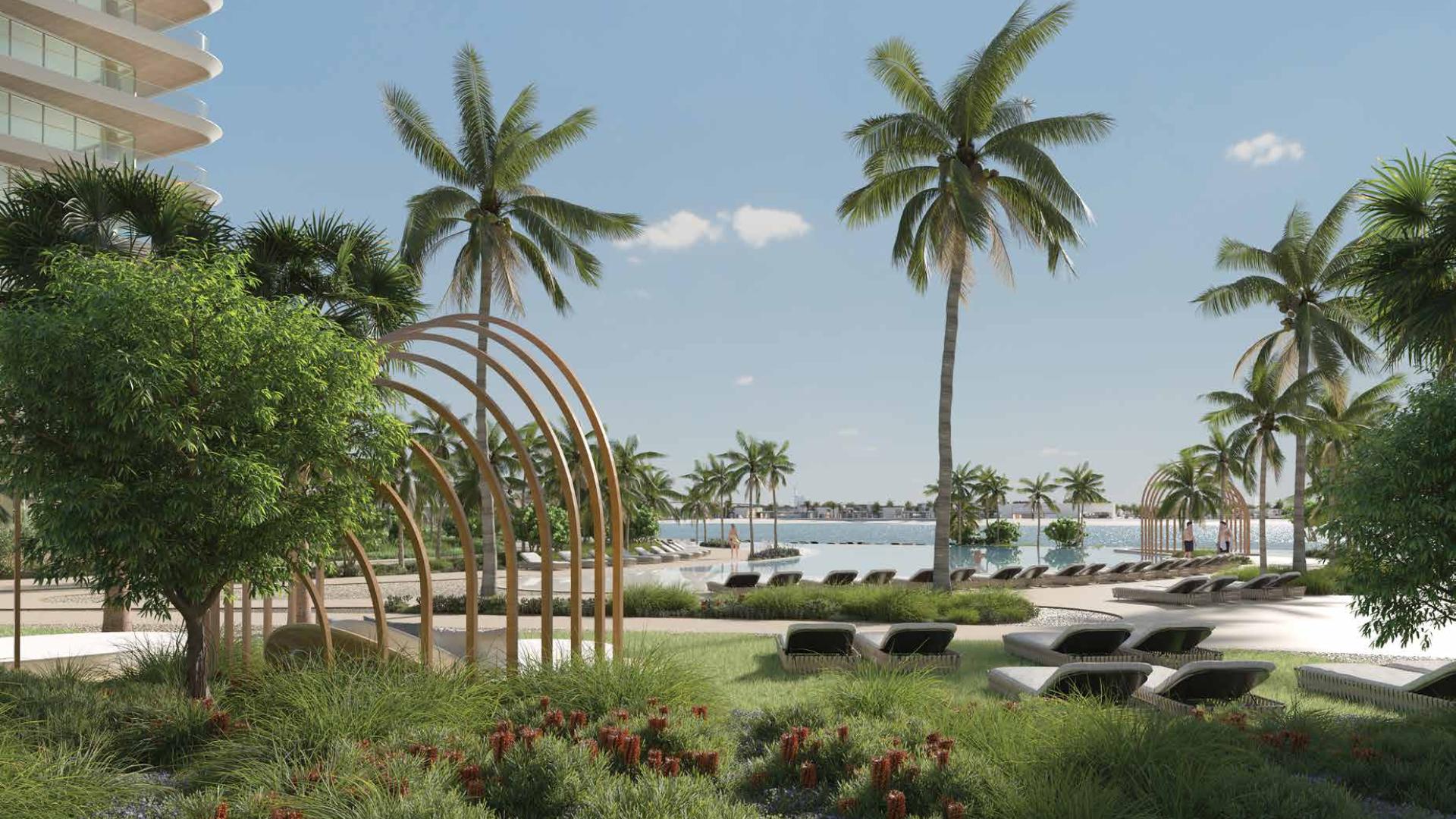 Outdoor tennis court and seating area at Serenia Living, Palm Jumeirah apartment complex