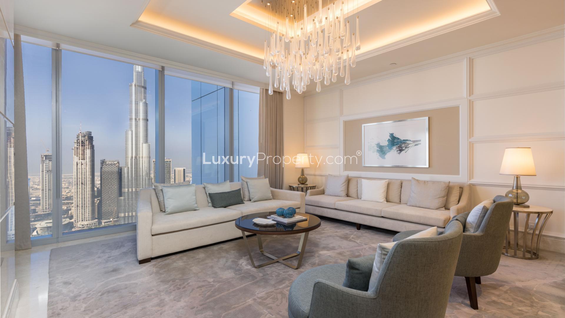 Luxurious dining area in Downtown Dubai penthouse with Burj Khalifa and fountain views
