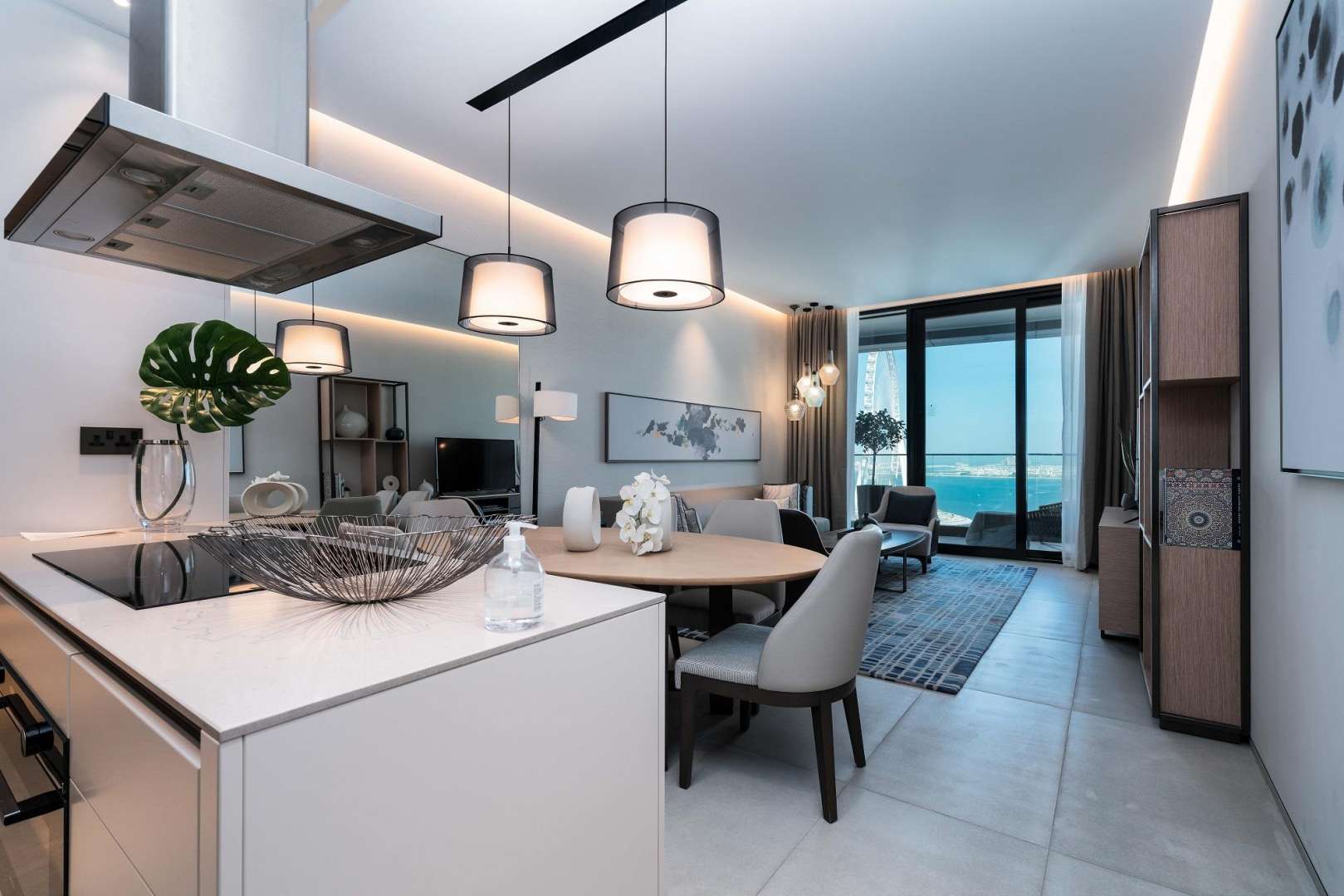 Modern kitchen and living area in four-bedroom apartment, The Address Jumeirah Resort, for sale