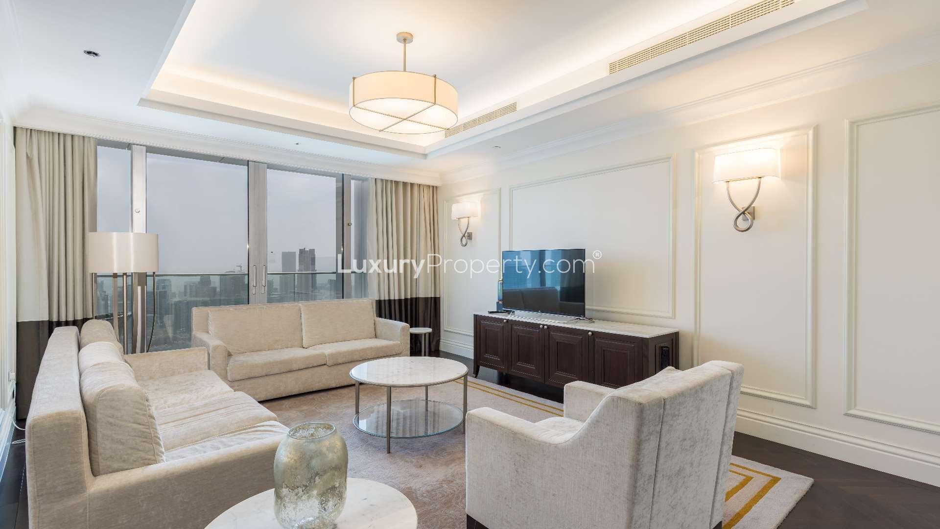 Luxurious living room in Downtown Dubai apartment with Burj Khalifa views, elegant decor