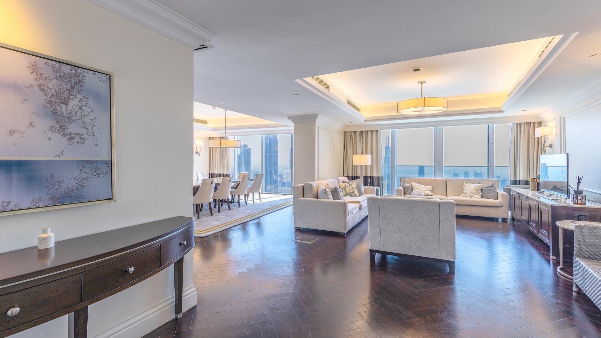 Furnished apartment living area with cityscape views in Downtown Dubai's The Address The BLVD