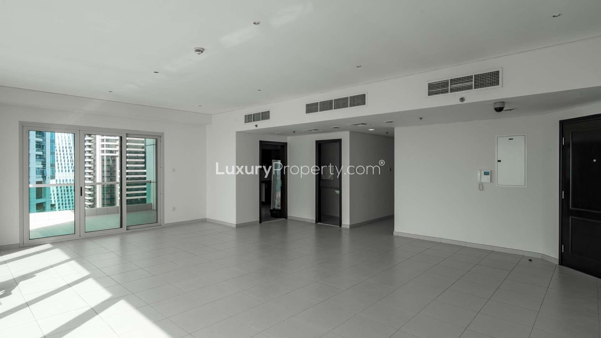 Four-bedroom apartment interior with Dubai Marina skyline view, Oceanic sub-community, for sale