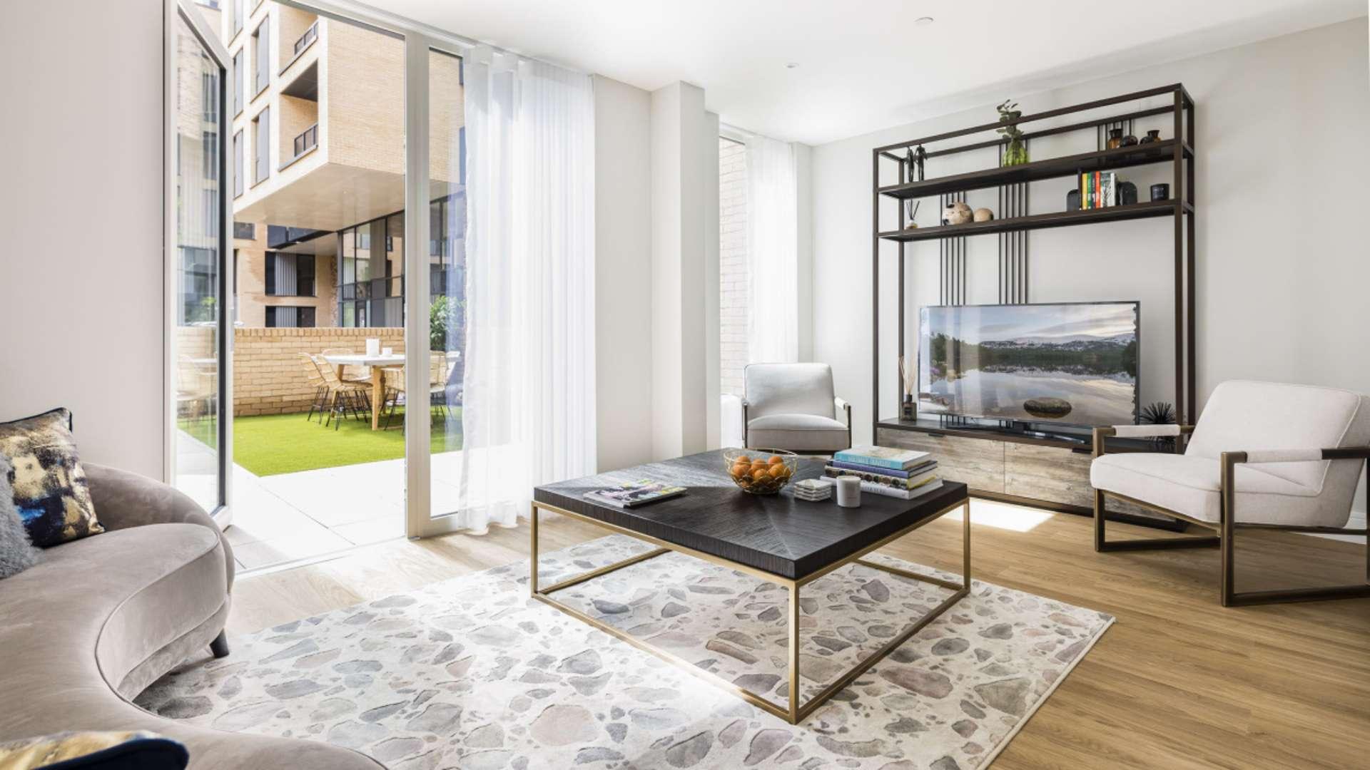 "Modern Wimbledon apartment exterior with landscaped garden, spacious balconies, and brick facade for sale.",Modern living room in 4-bedroom maisonette, Wimbledon Grounds, London, with outdoor patio view
