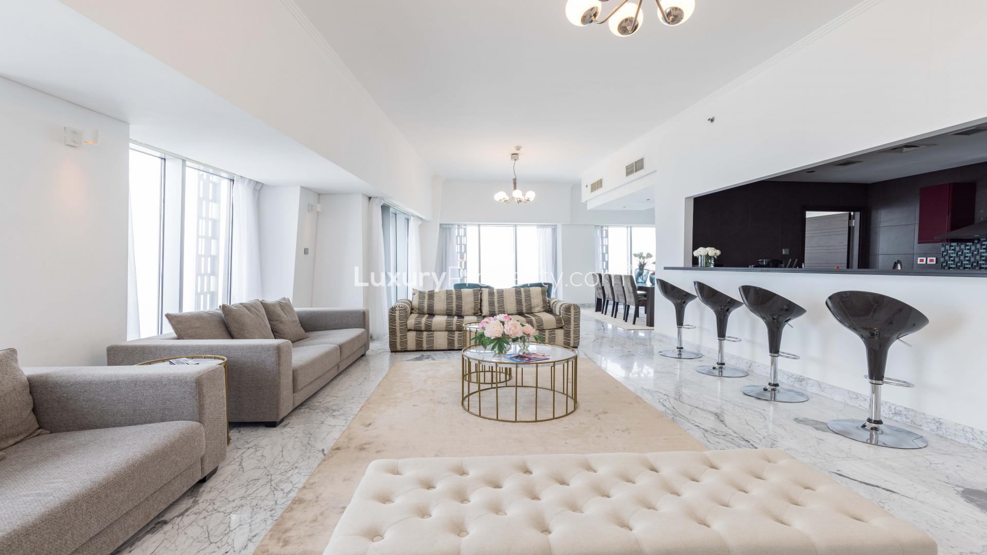 Contemporary dining area in furnished Dubai Marina apartment, Cayan Tower, available for rent