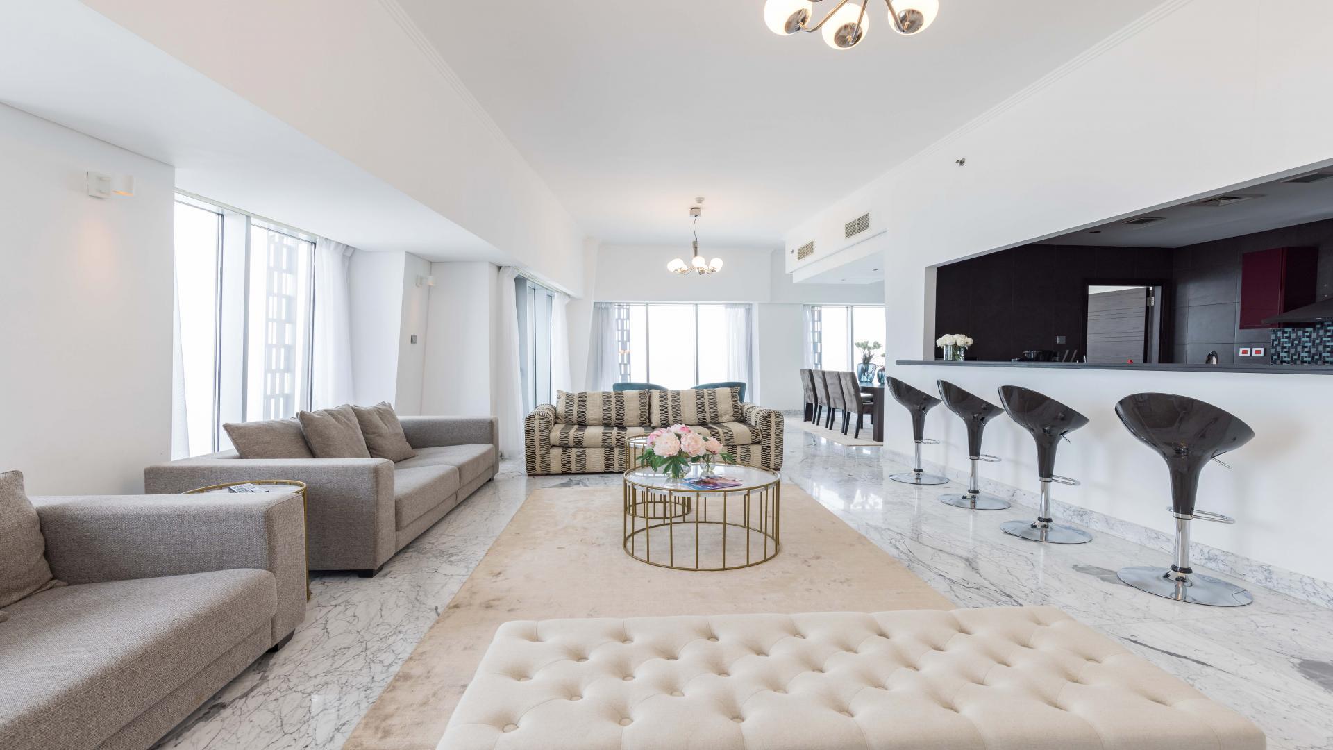 Contemporary dining area in furnished Dubai Marina apartment, Cayan Tower, available for rent