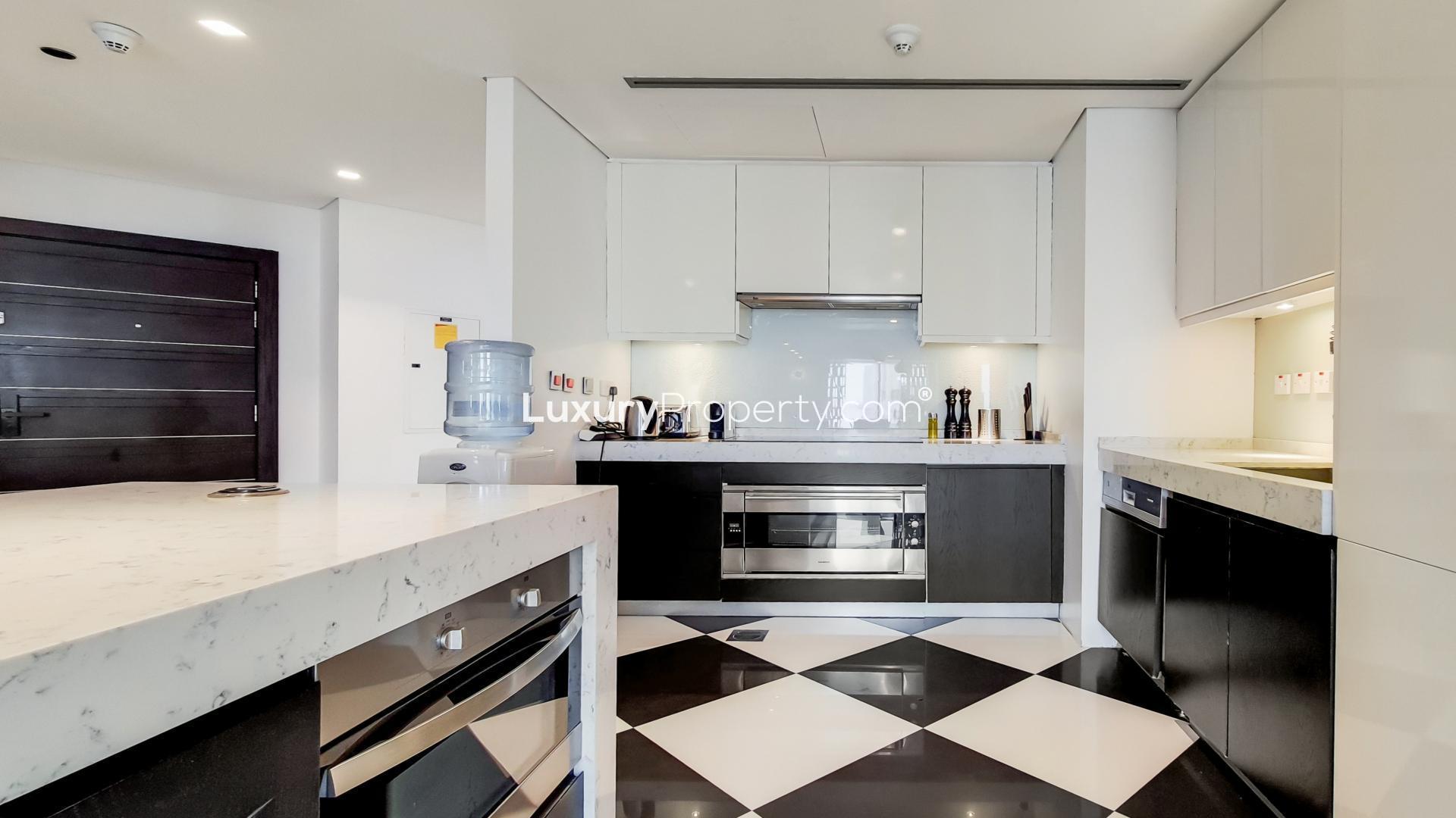 Luxurious furnished living room in upgraded Dubai Marina apartment, Cayan Tower, for rent