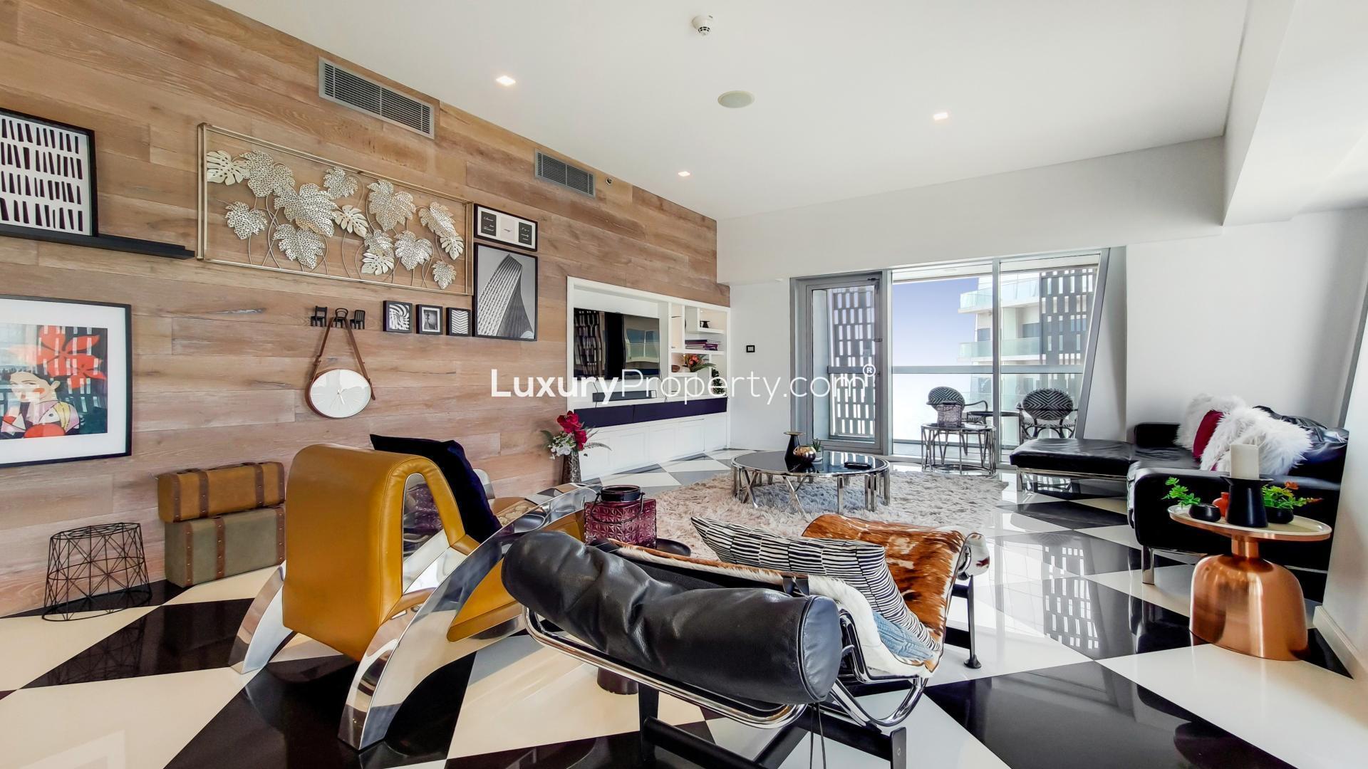 Dubai Marina skyline view from Cayan Tower apartment, featuring waterfront and luxury yachts