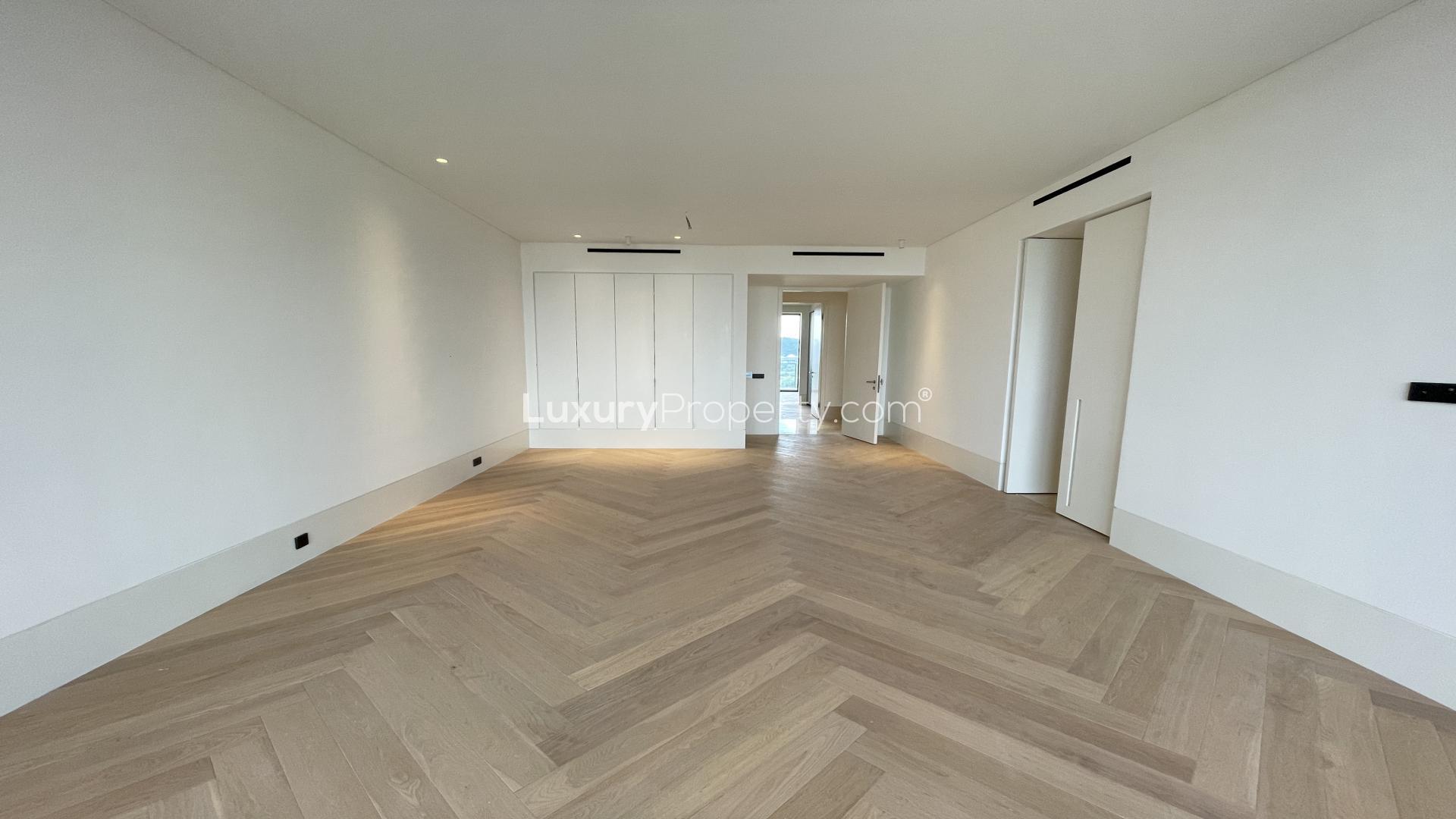 Spacious living room with wooden flooring in AIRA Residence, Kuala Lumpur condominium for sale