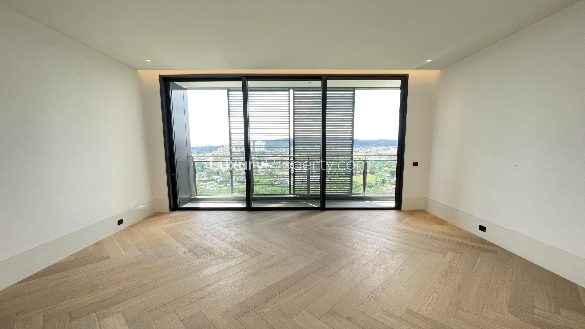 "Spacious balcony with panoramic views in AIRA Residence, Damansara Heights, Kuala Lumpur condominium.",Empty room with wooden floor and large window in AIRA Residence, Kuala Lumpur condominium
