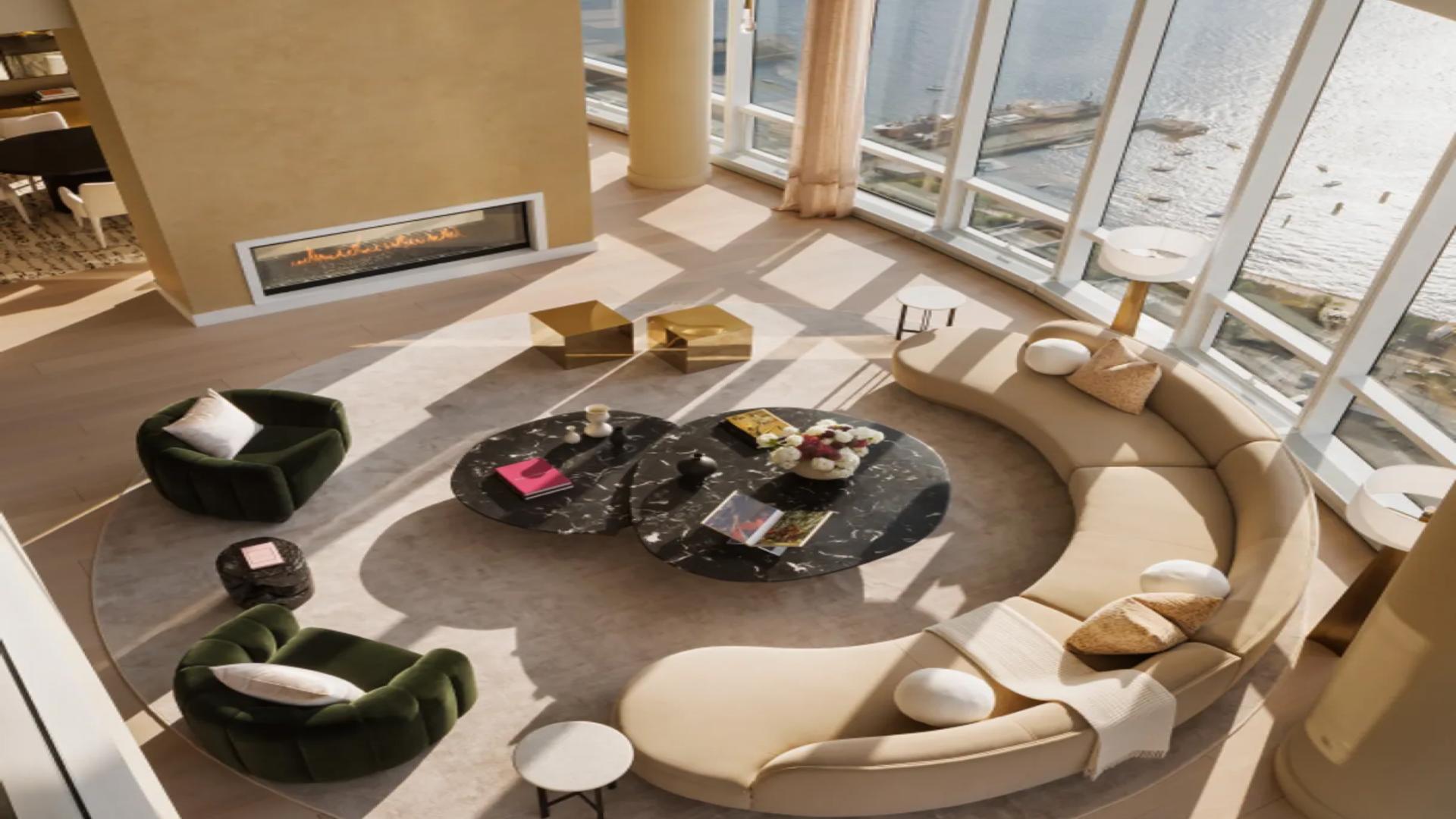 Double-height penthouse living room with Manhattan skyline views and modern staircase