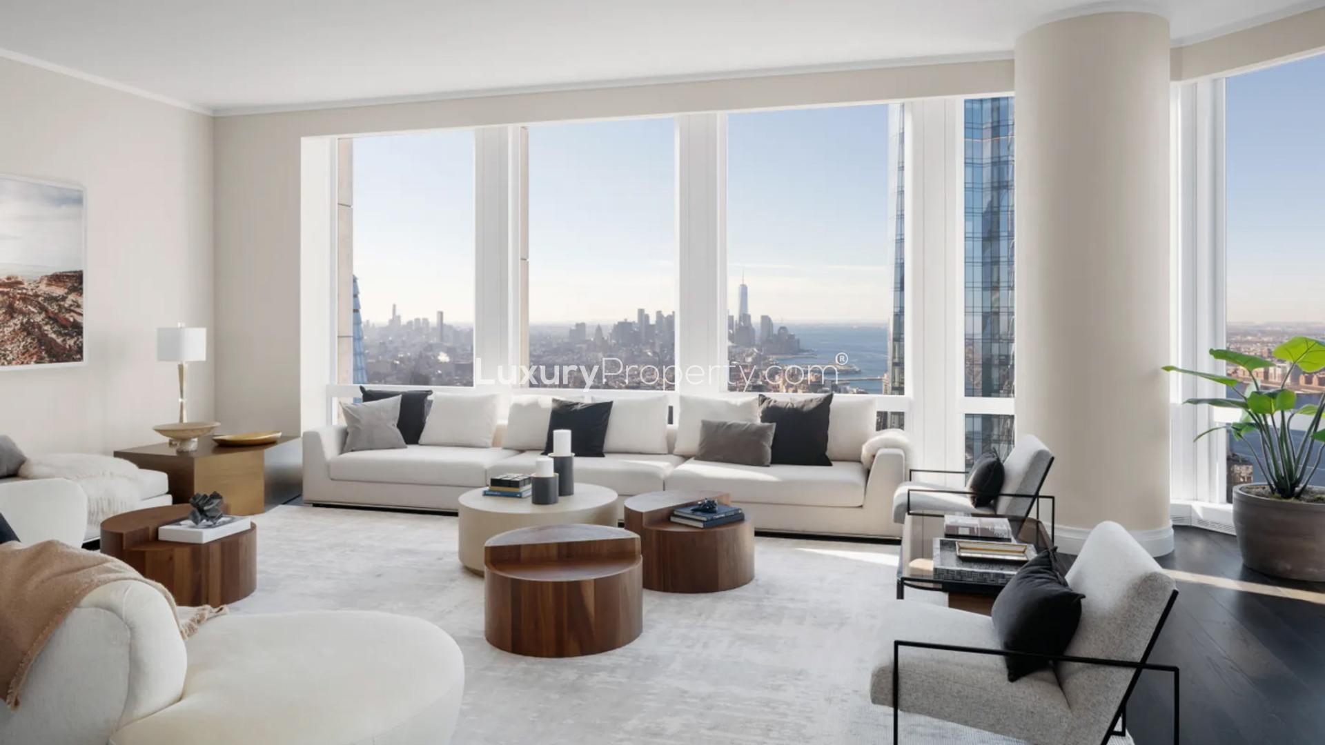 Luxurious Manhattan condo living room with panoramic Hudson River views, modern decor, spacious layout
