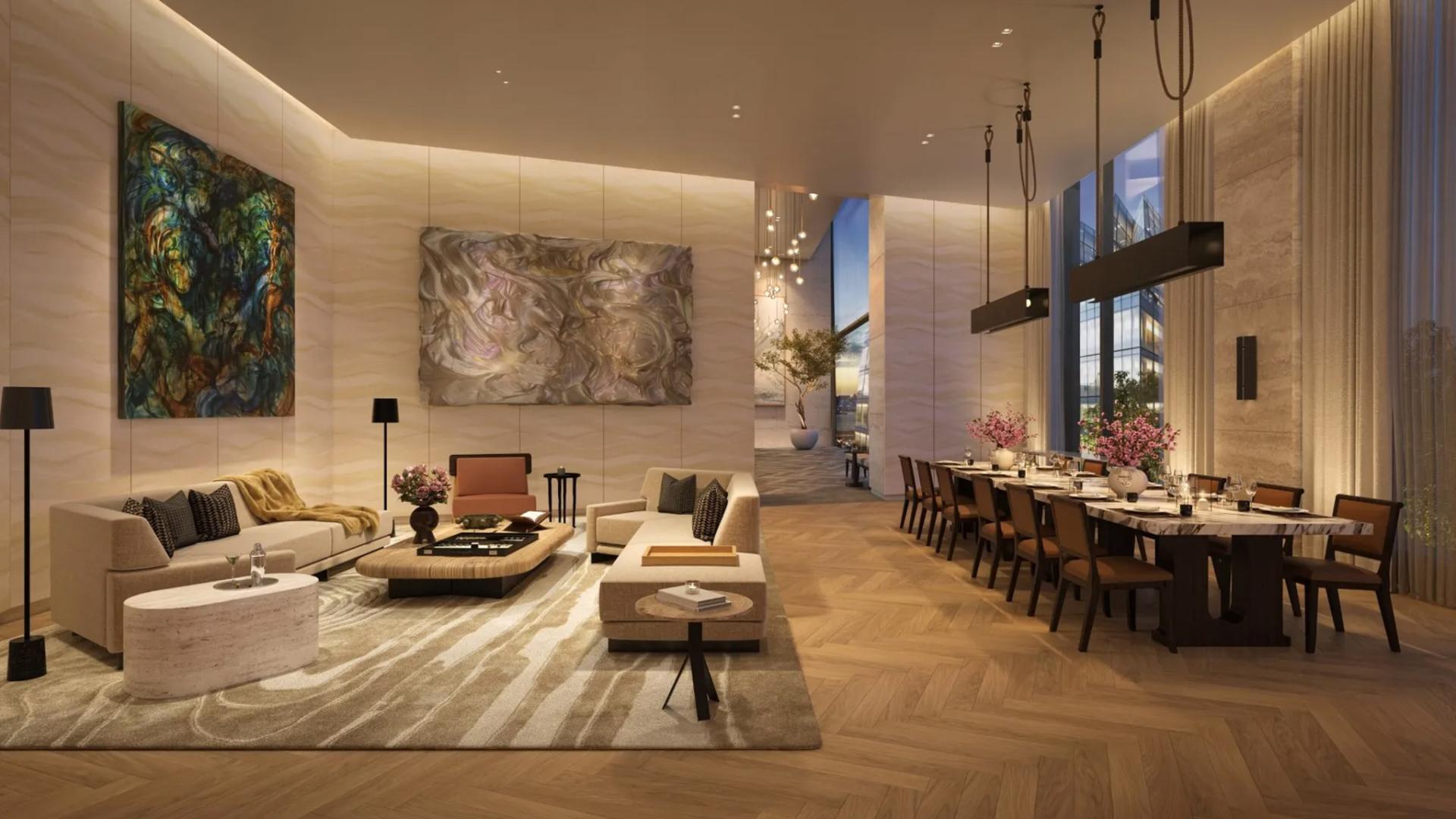"Luxurious Manhattan condo living room with High Line views, modern decor, spacious seating area.",Luxurious living and dining area in Manhattan condominium with elegant decor and high ceilings