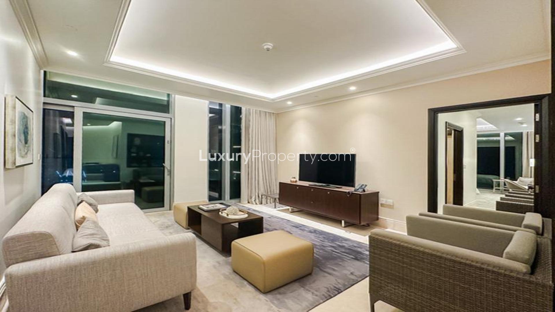 High-floor penthouse view of Burj Khalifa and Downtown Dubai skyline at sunset