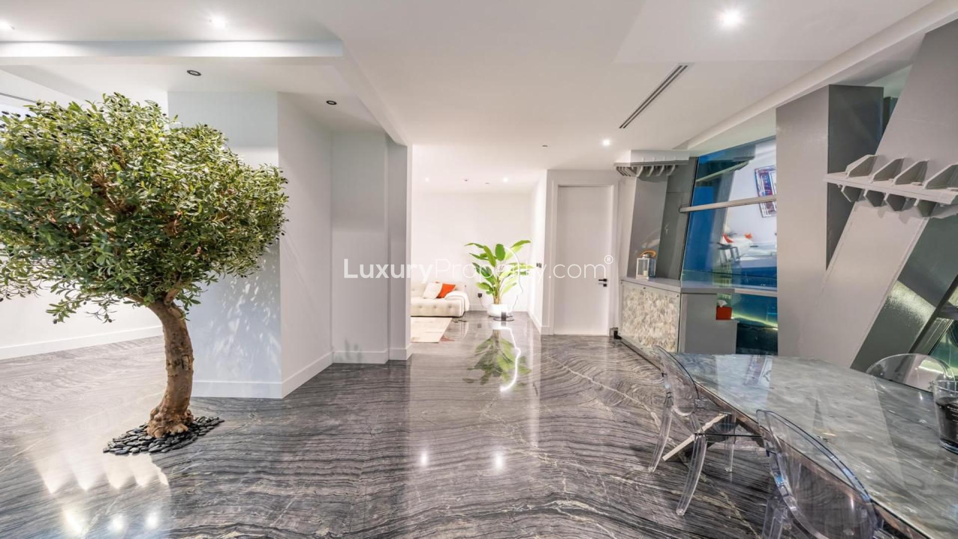 Luxury penthouse kitchen in Cayan Tower, Dubai Marina with modern design and sea views