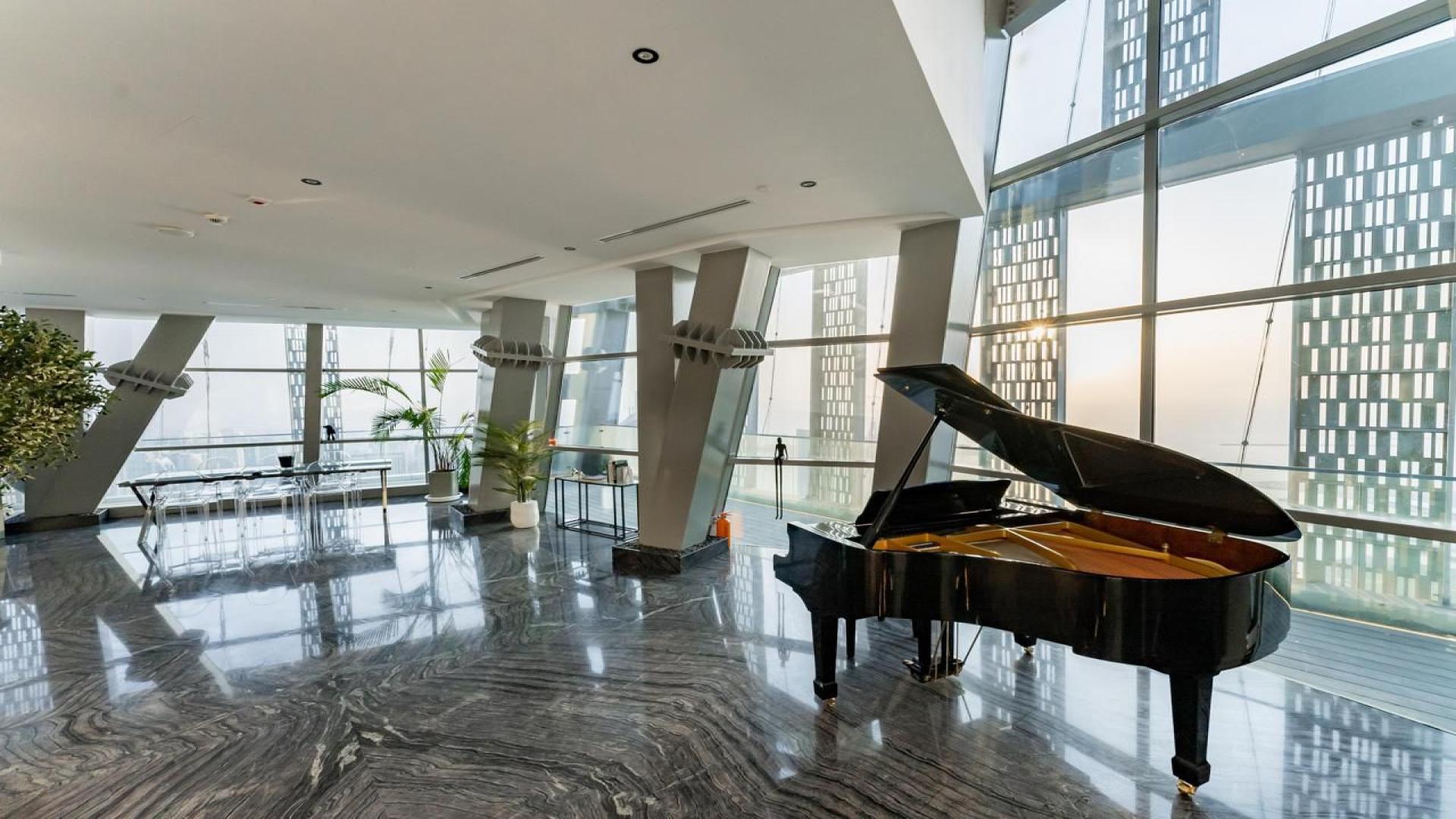 Luxurious penthouse interior with grand piano