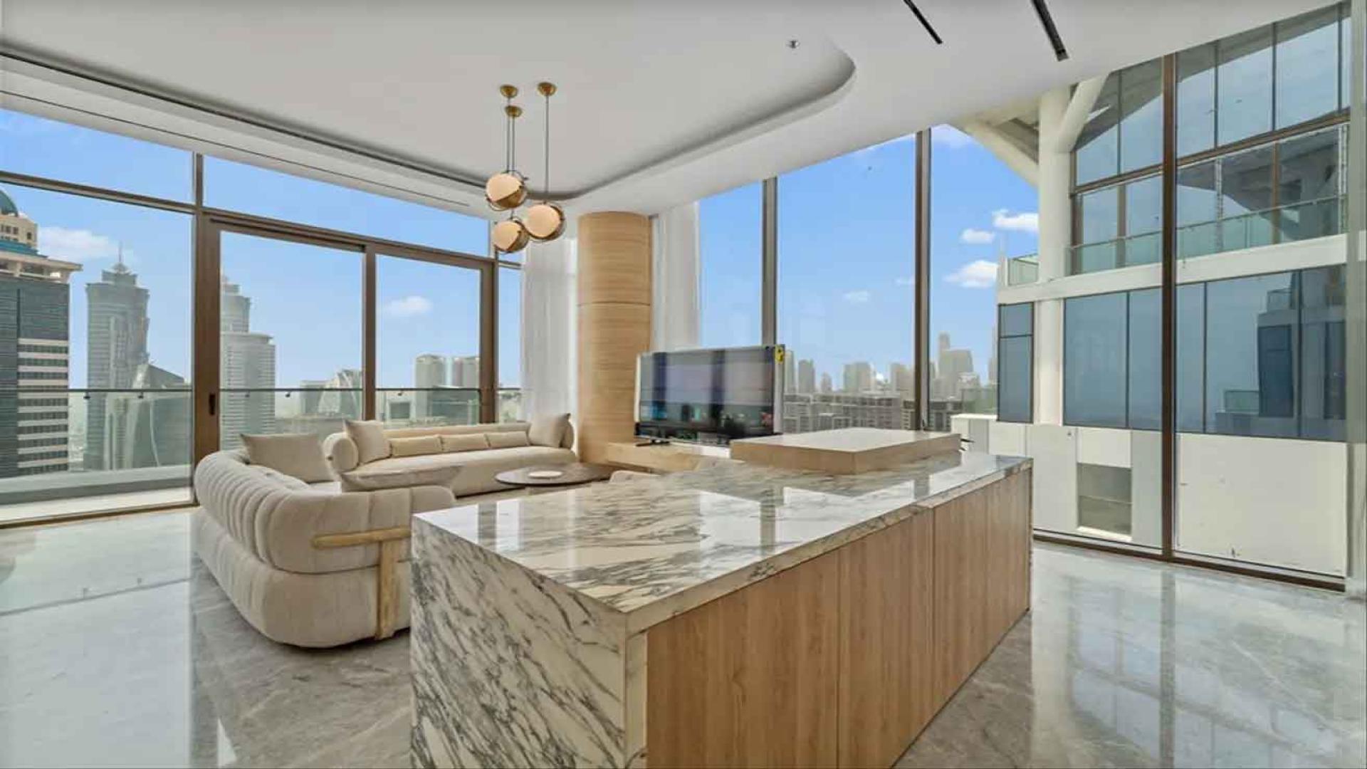 High-end furnished penthouse living room with city views, Business Bay, One of One Residences