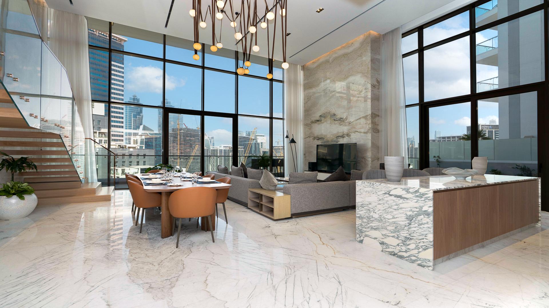 Luxurious living room in Business Bay penthouse, featuring modern design and elegant decor